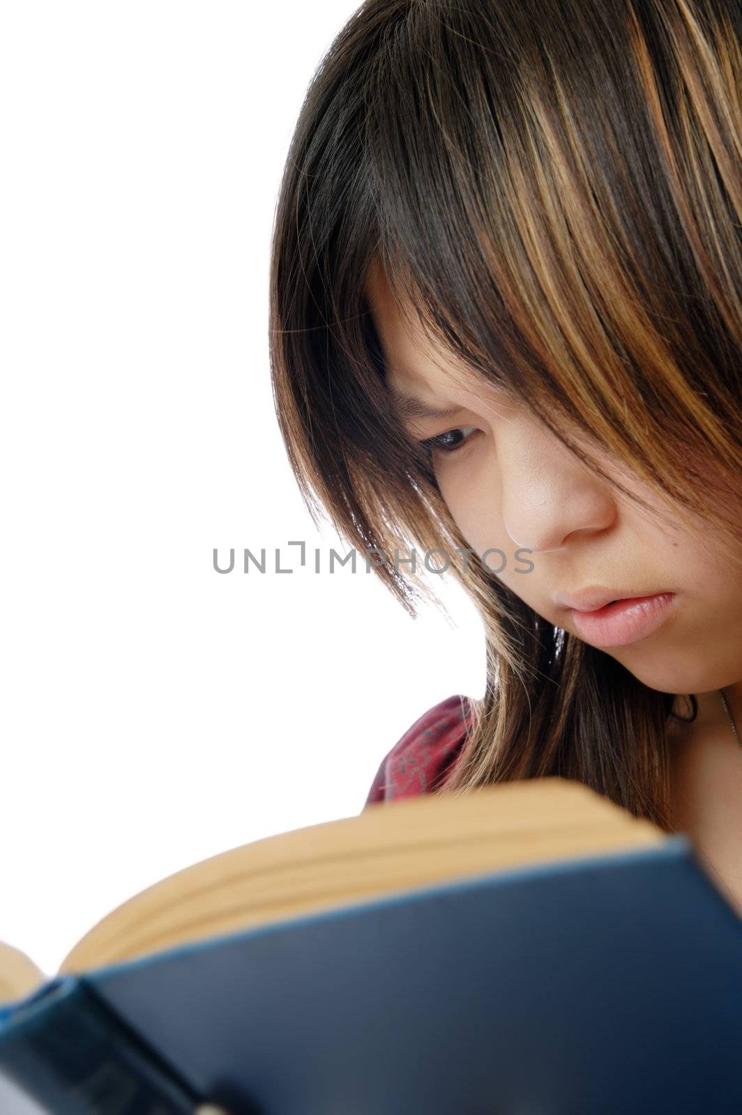 Young student trying to understand difficult book