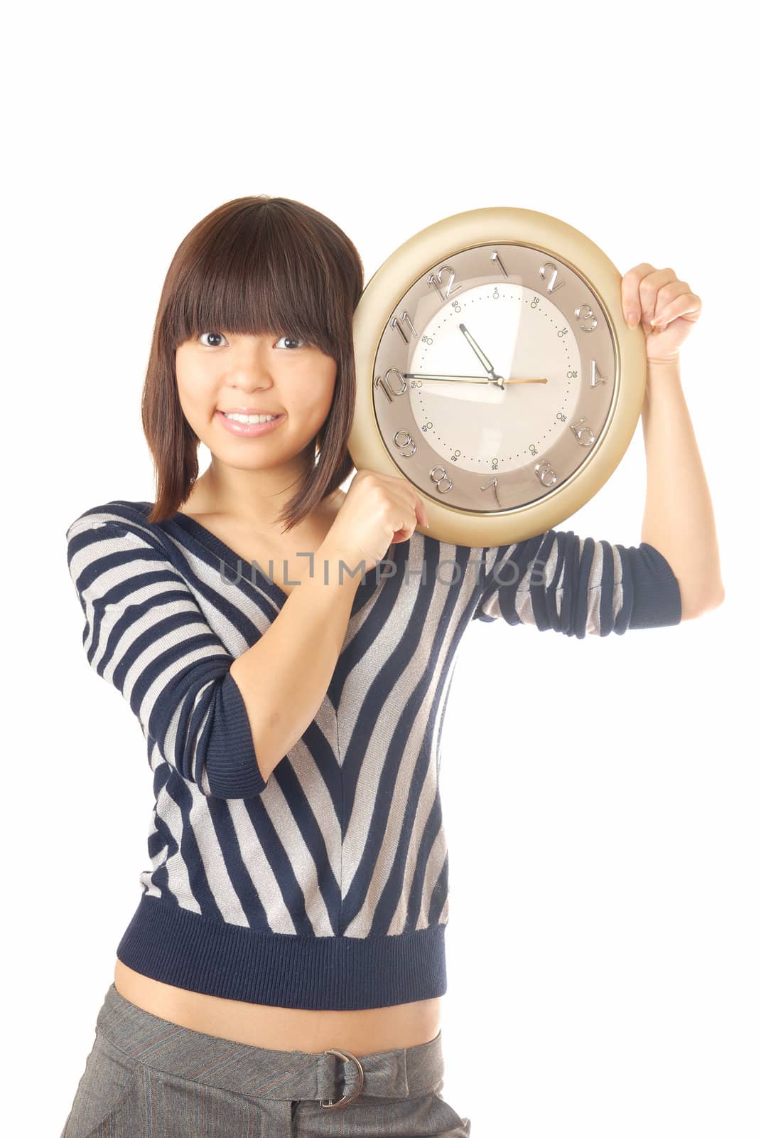 Photo of the smiling lady holding the clock