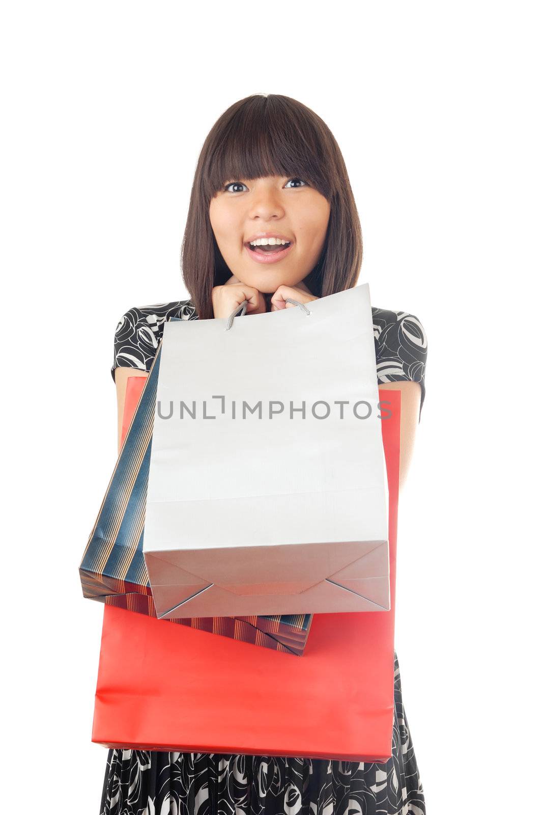 Photo of the glad lady with three shopping packages