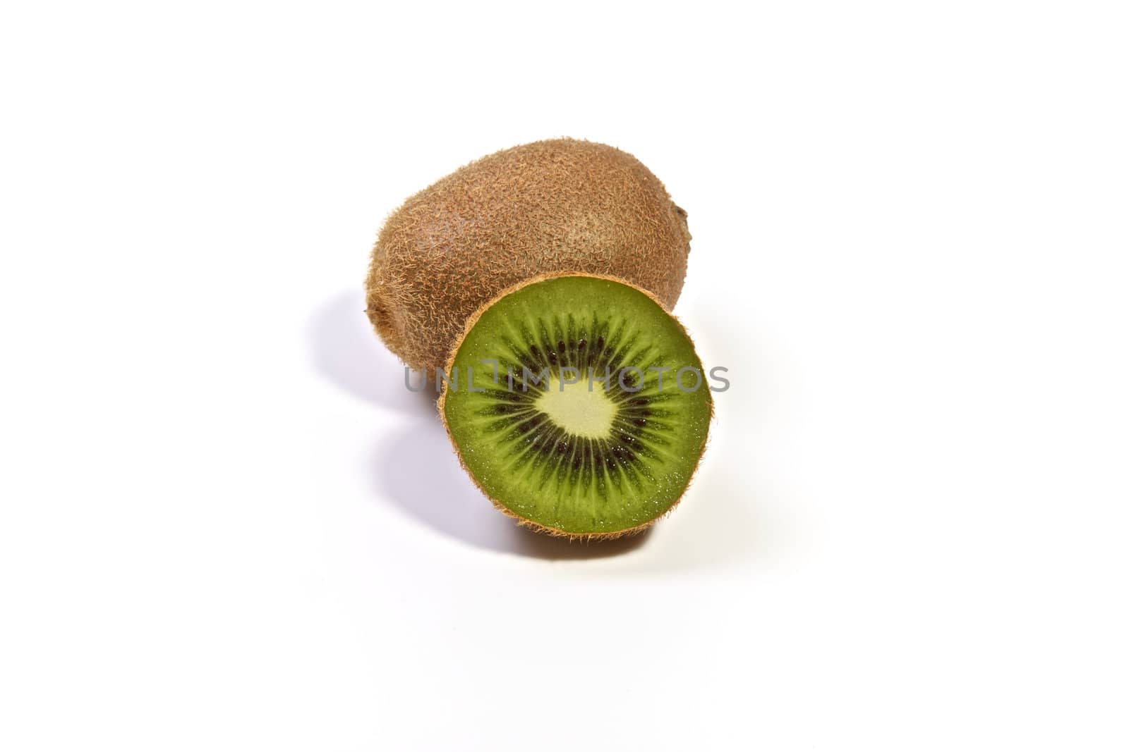 Delecious kiwifruit cut and isolated on a white background