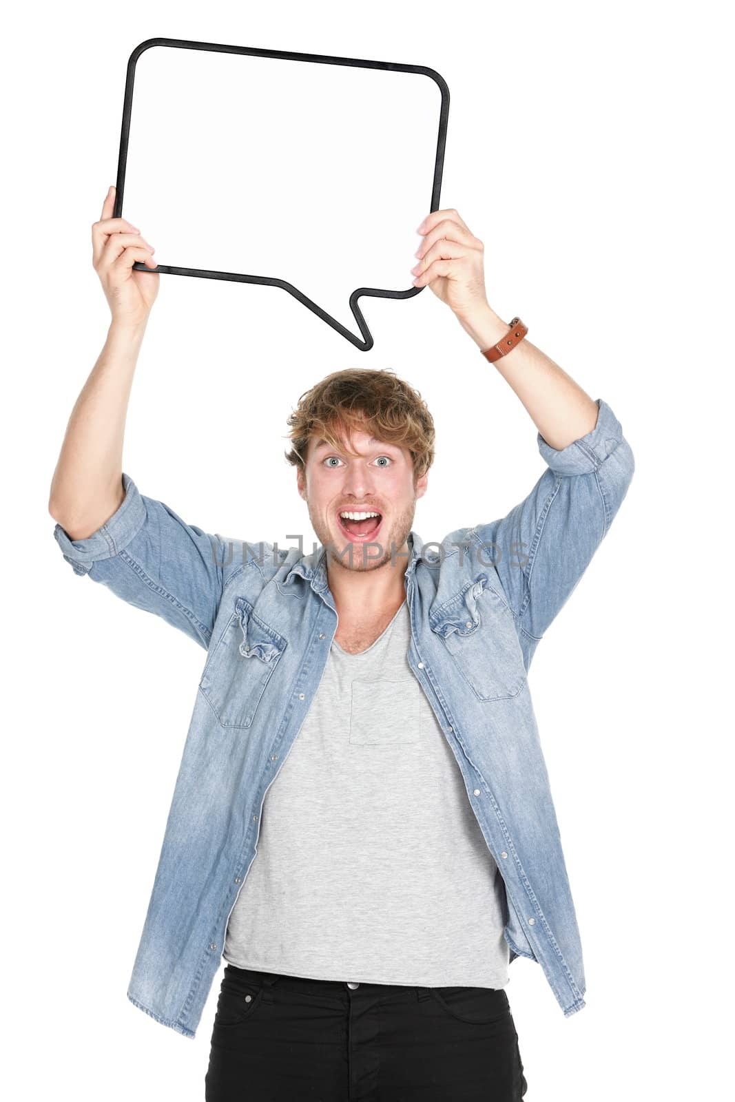 Man holding sign speech bubble screaming excited. Young casual caucasian man in his twenties. Isolated on white background.