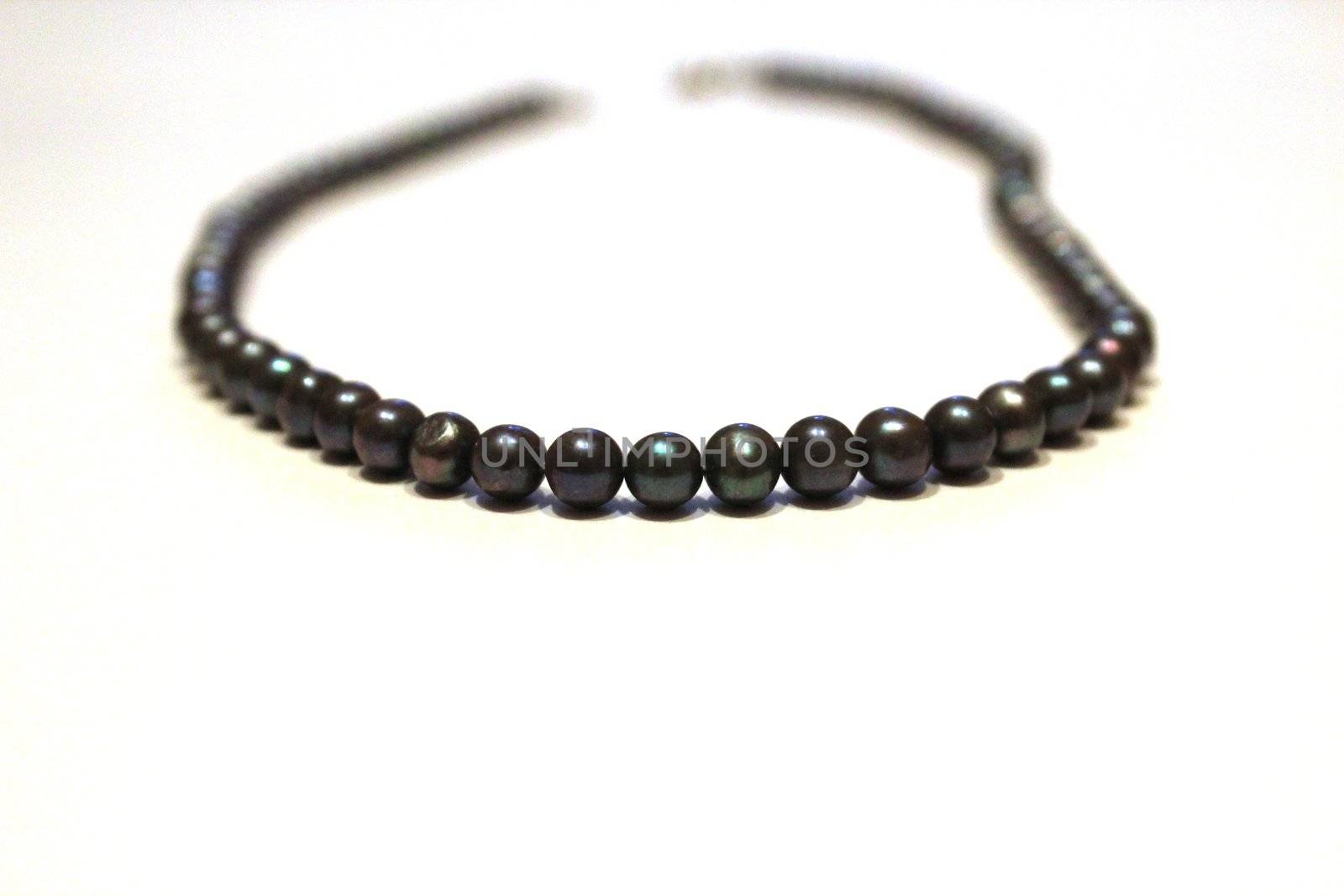 necklace of black pearls by Metanna