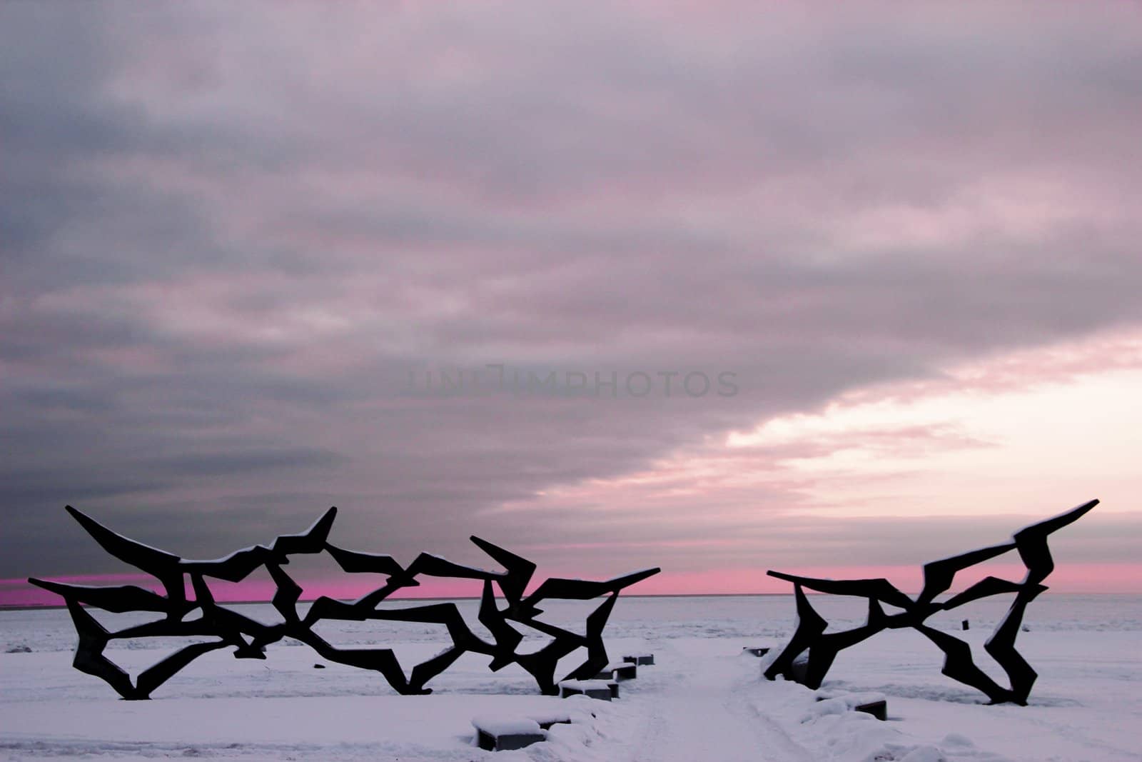 winter landscape with a monument of swallows. the main beach in Saint-Petersburg.