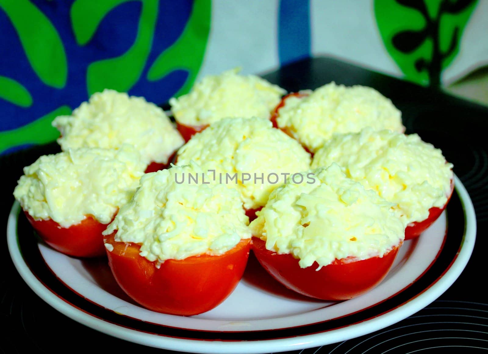 Tomatoes with cheese snack Jewish on a plate