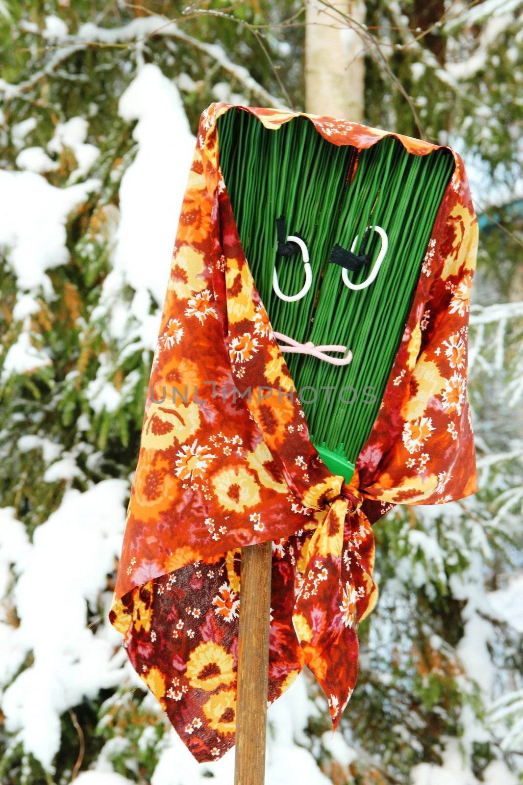 Funny broom with an ugly face in winter by Metanna