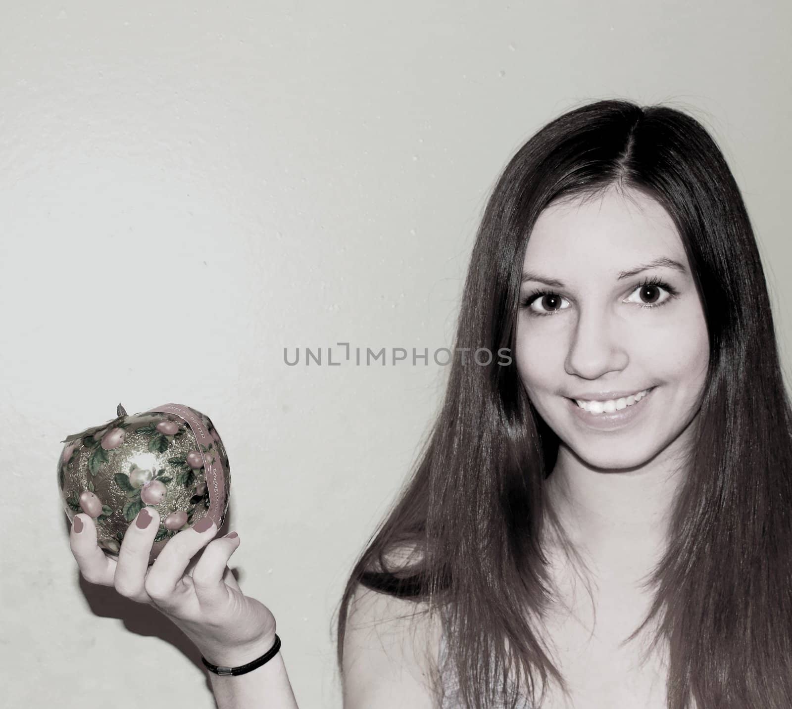 Smiling girl with shiny apple. by Metanna