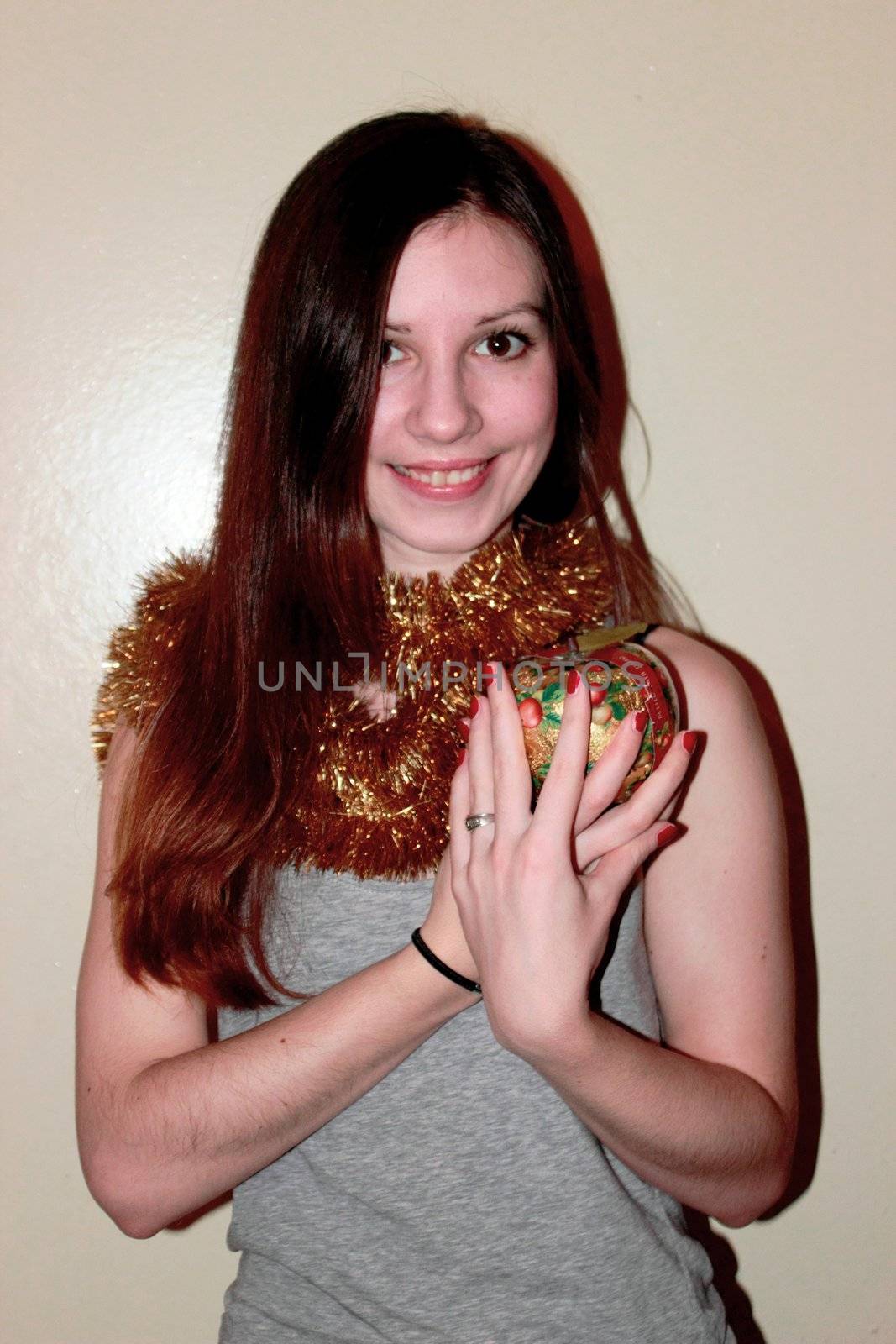 Cheerful girl with an apple on his head by Metanna