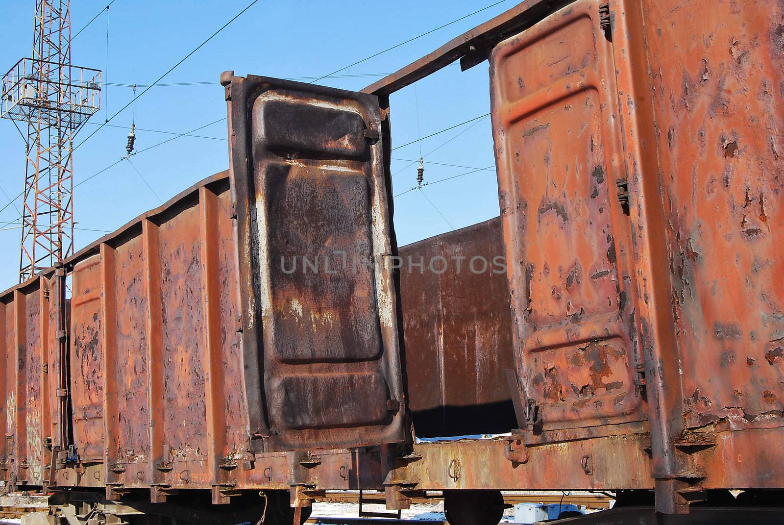 Abandoned metal rusty goods wagon, open door, concept