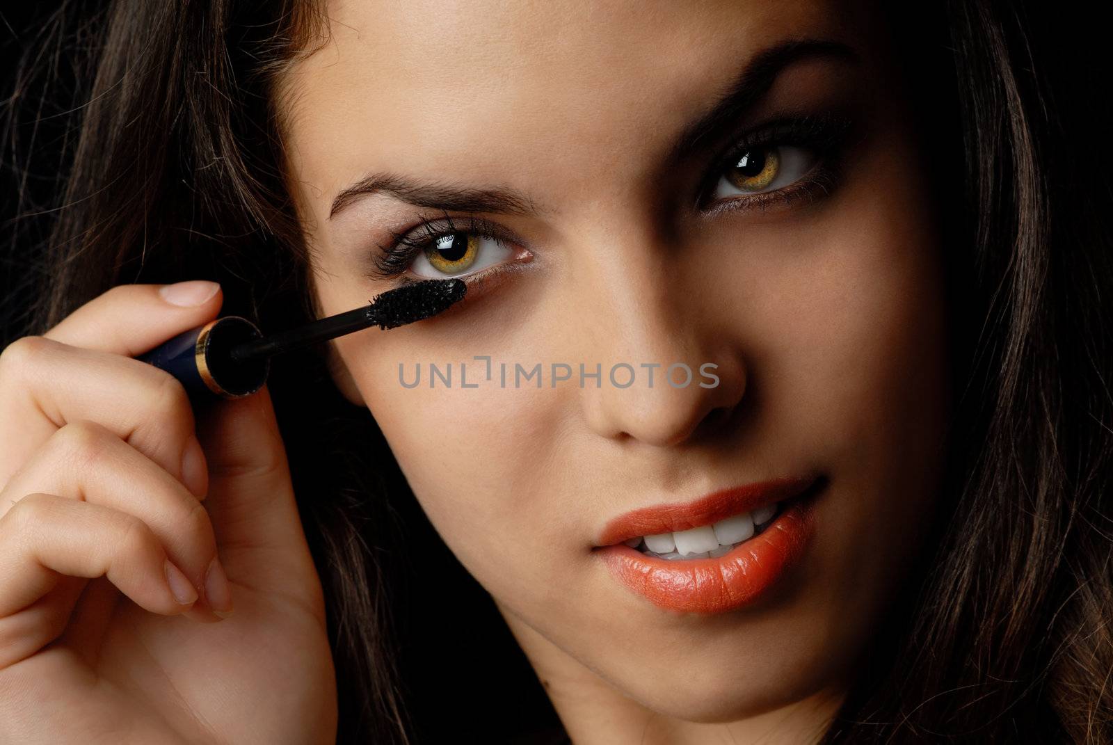 Beautiful lady applying makeup brush





Beautiful lady applying