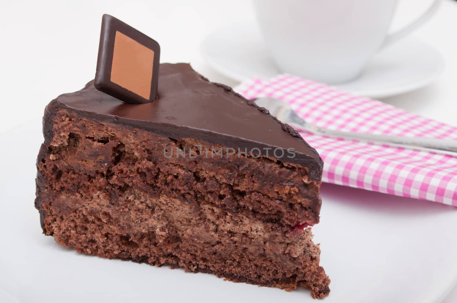 Dessert - Chocolate Cake and White Cup on Table