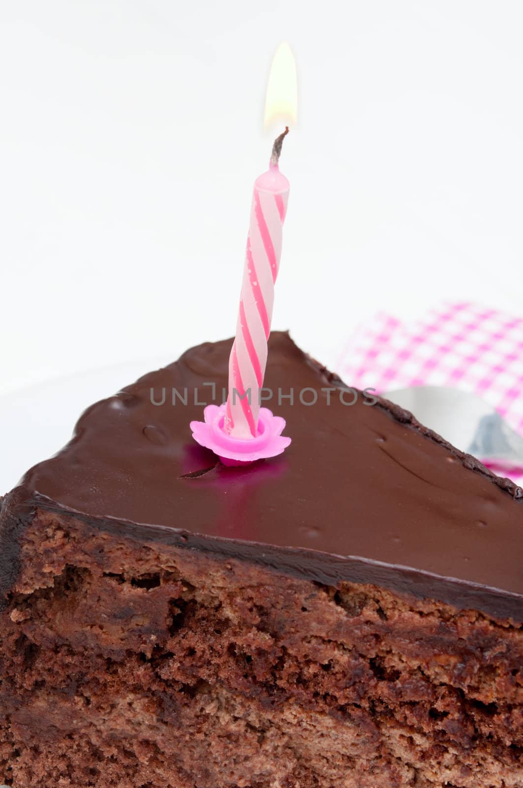 Closeup of Birthday Cake - Chocolate Dessert with Burning Candle