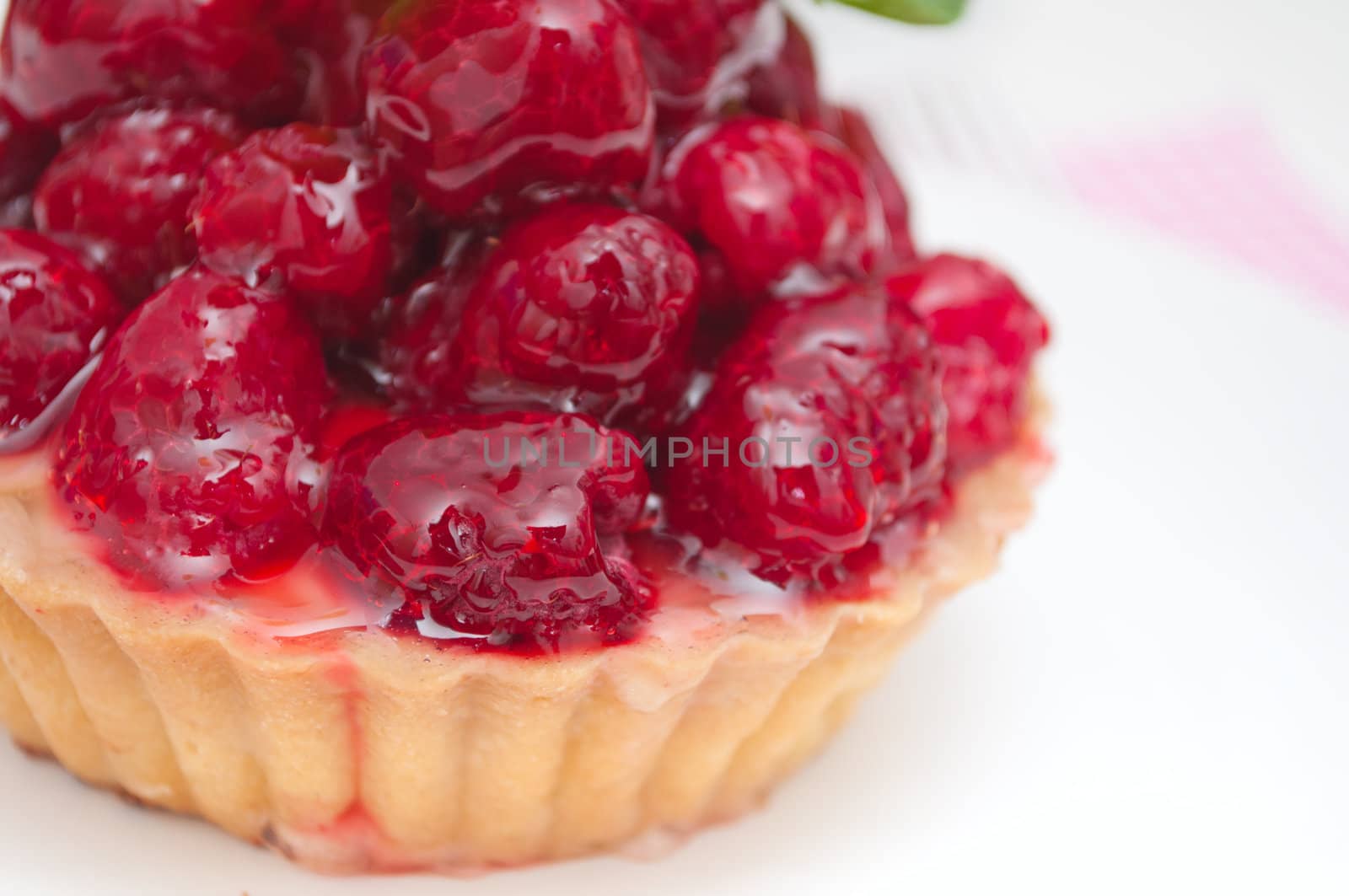 Detail of Fruit Dessert With Raspberries on White Plate - Shallow Depth of Field