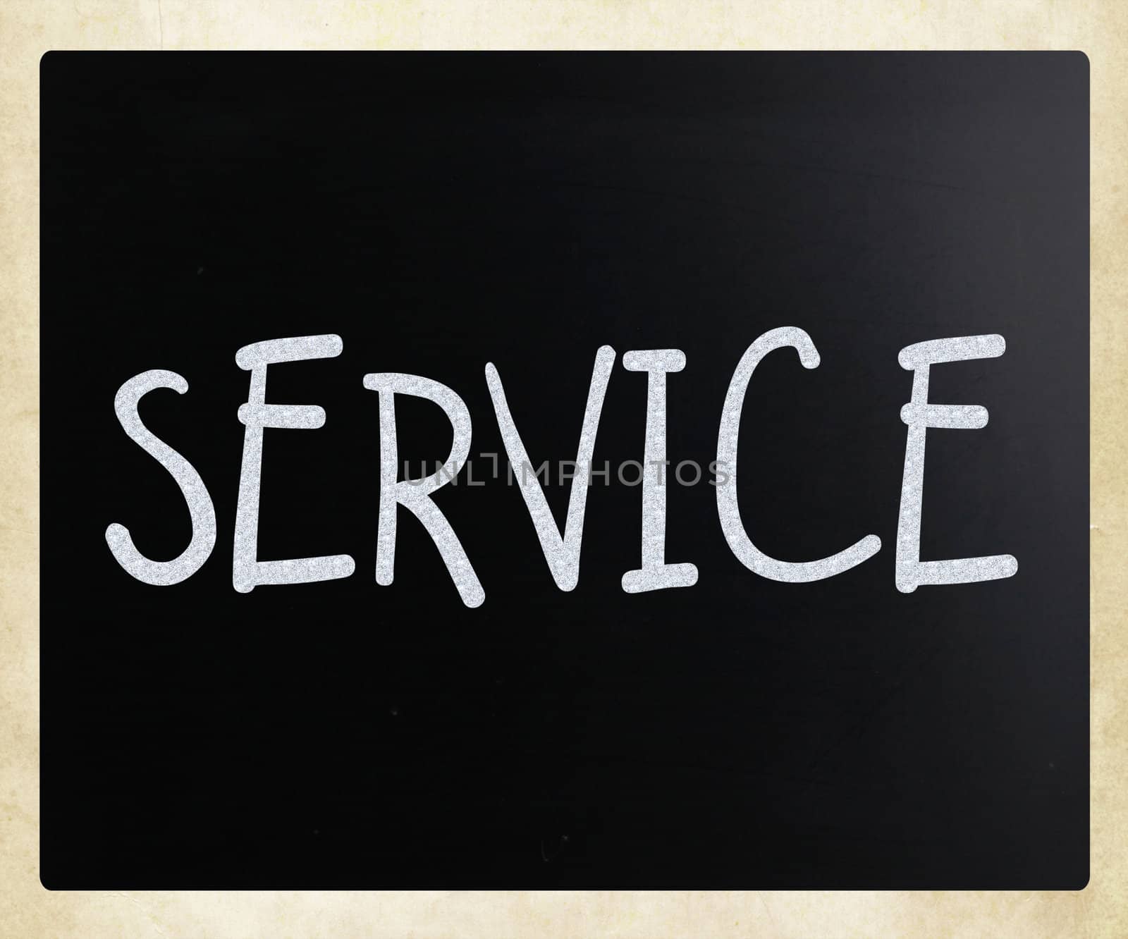 "Service" handwritten with white chalk on a blackboard