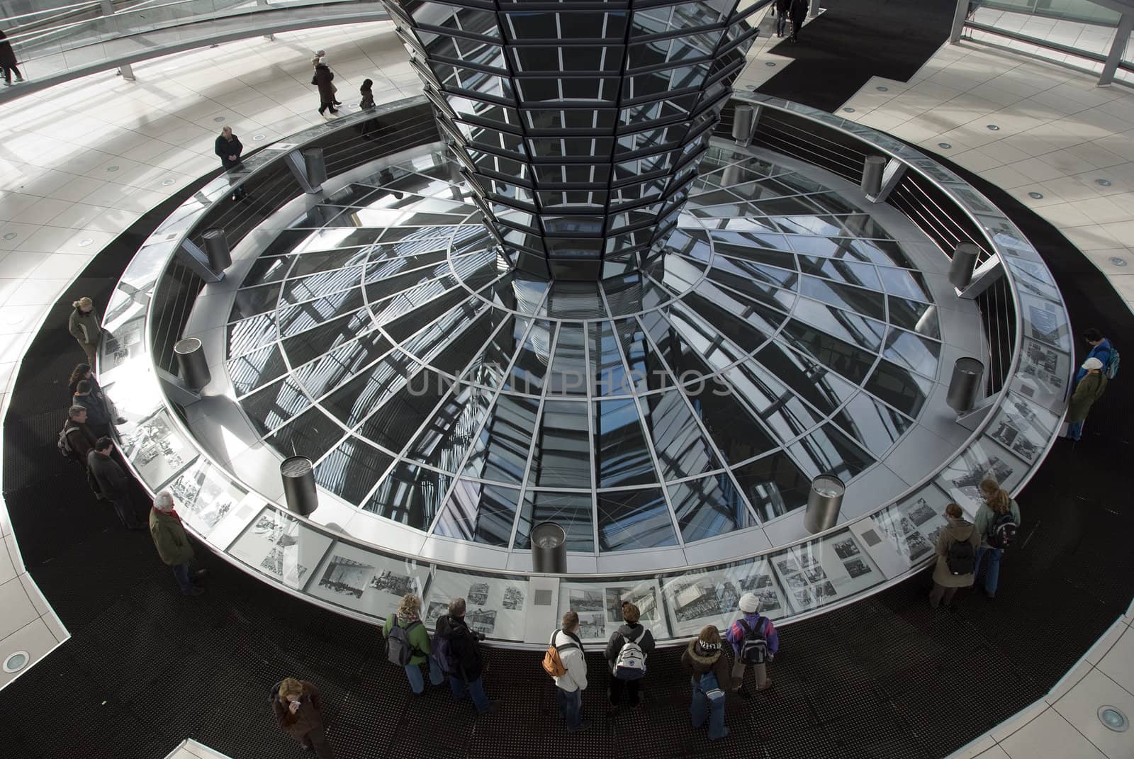 people in the Cupola on top of the Reichstag building in Berlin