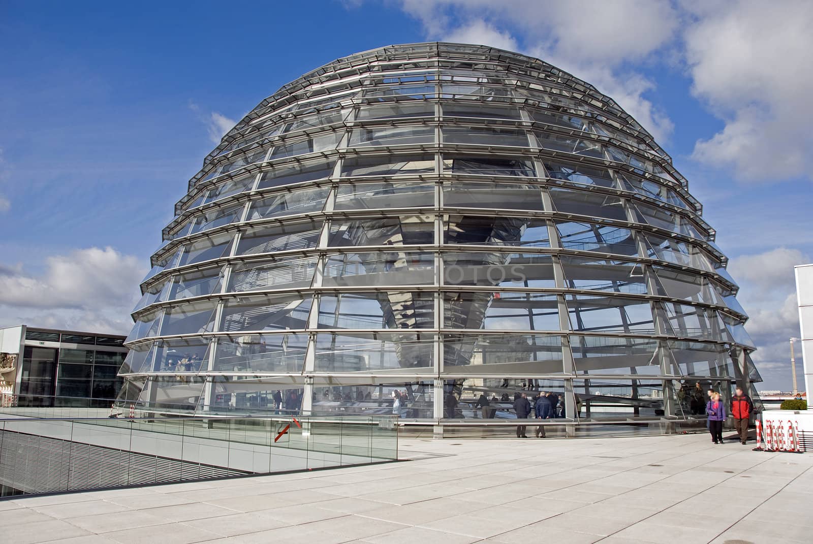 people in the Cupola on top of the Reichstag building in Berlin
