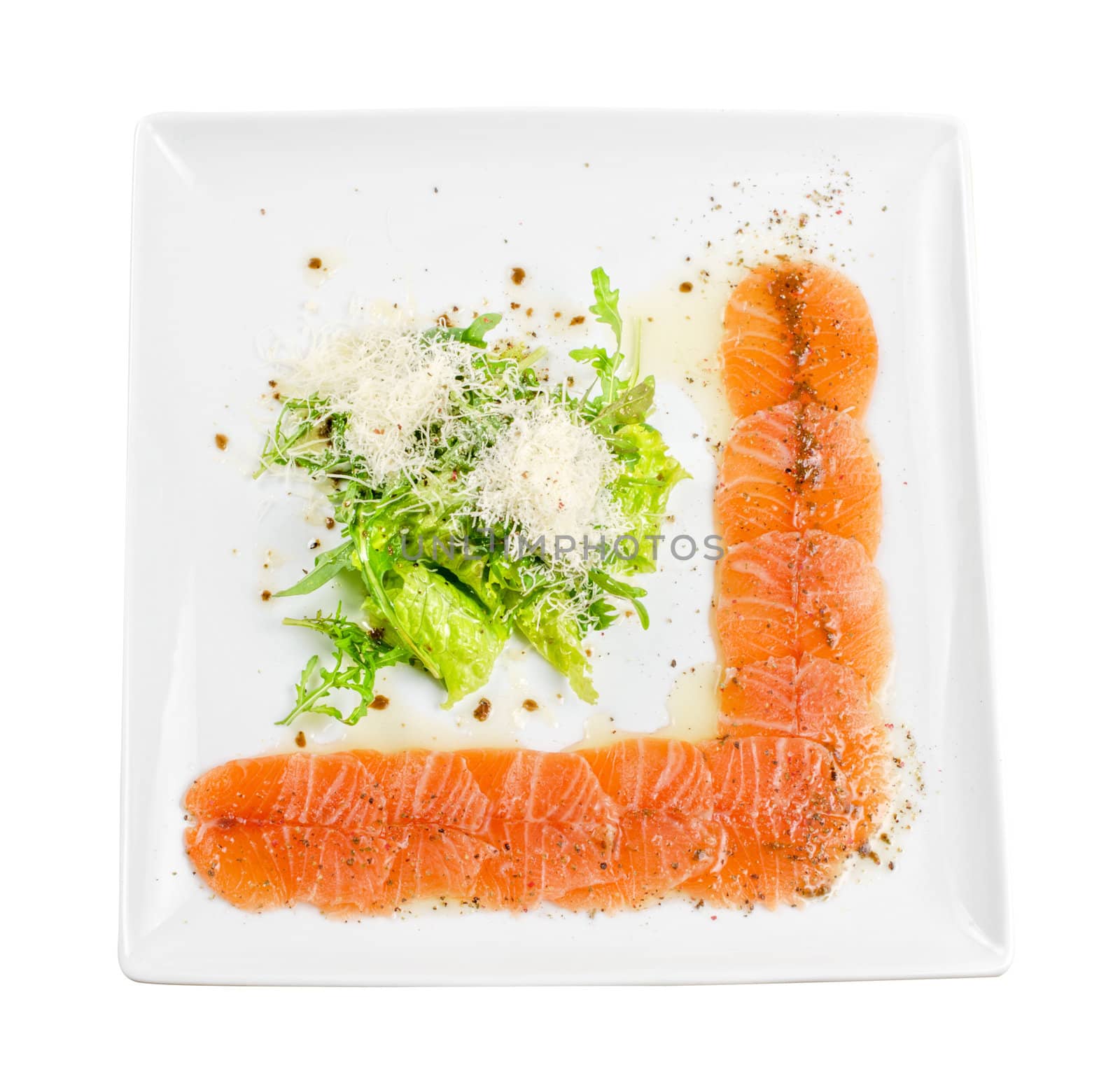 Fish Carpaccio with salad and mozzarella on a white
