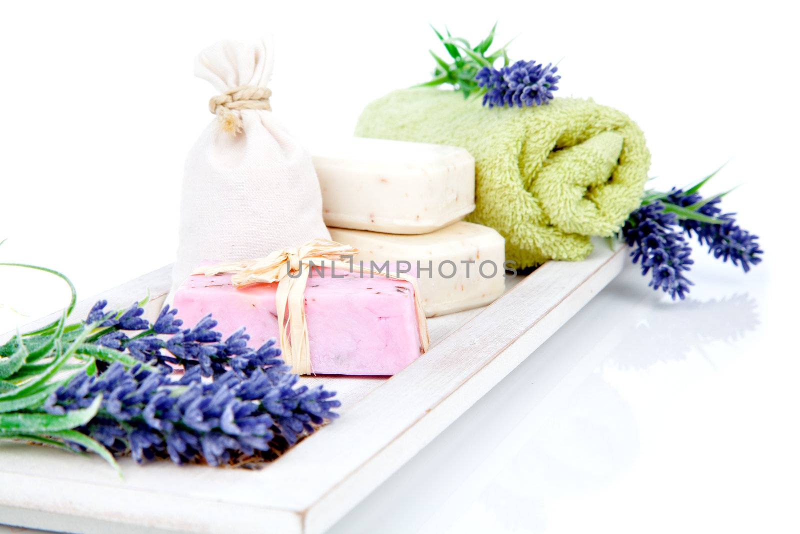 toiletries for relaxation - towel, soap, isolated on white background