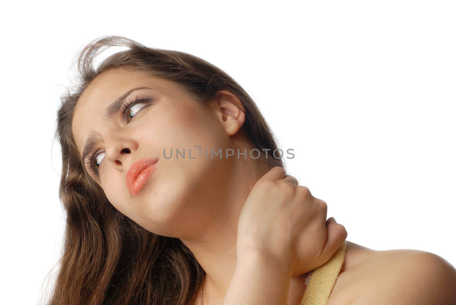 Sad tired woman massaging her neck and suffering from pain 