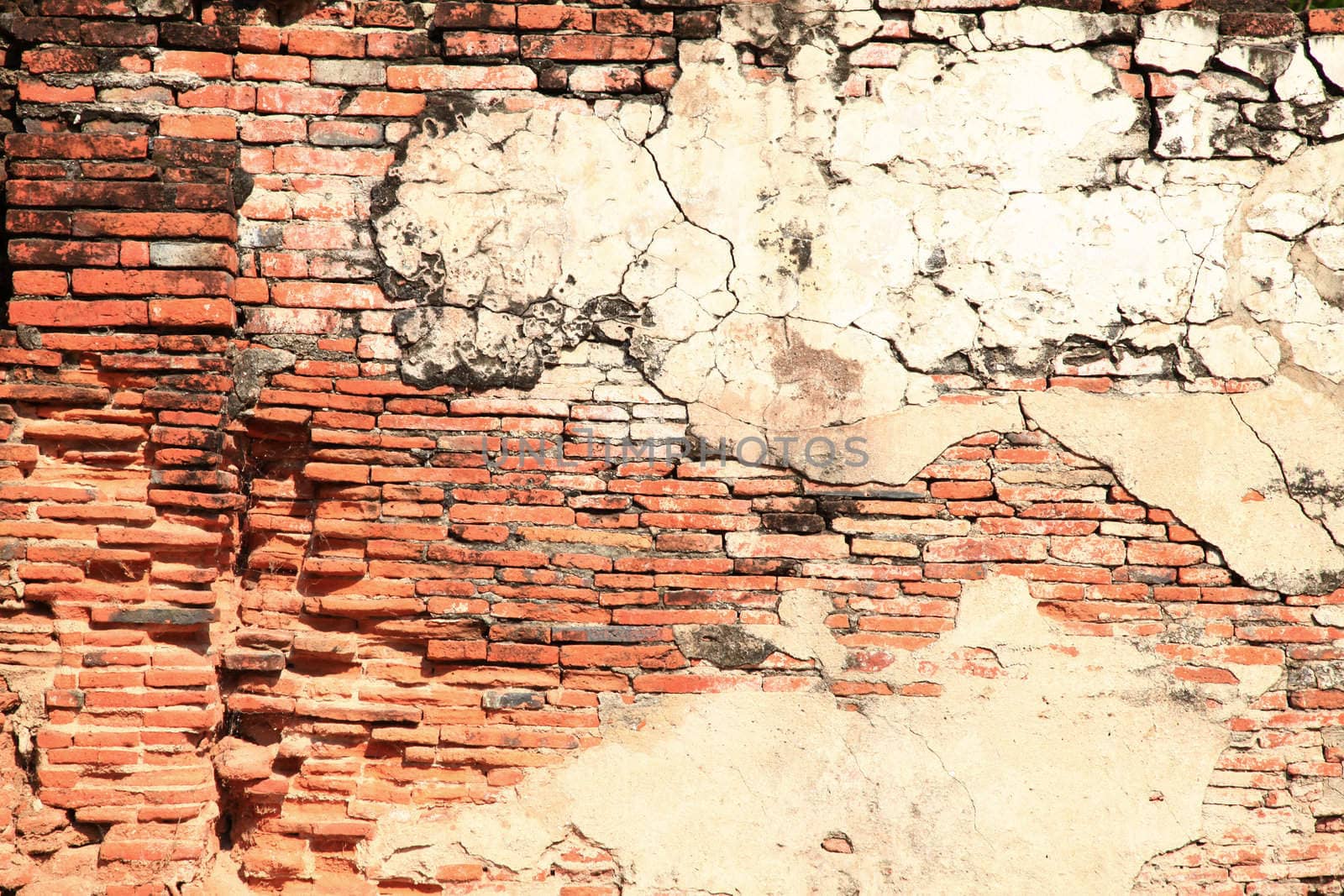 ruin monastery temple wall from red brick using as background pattern