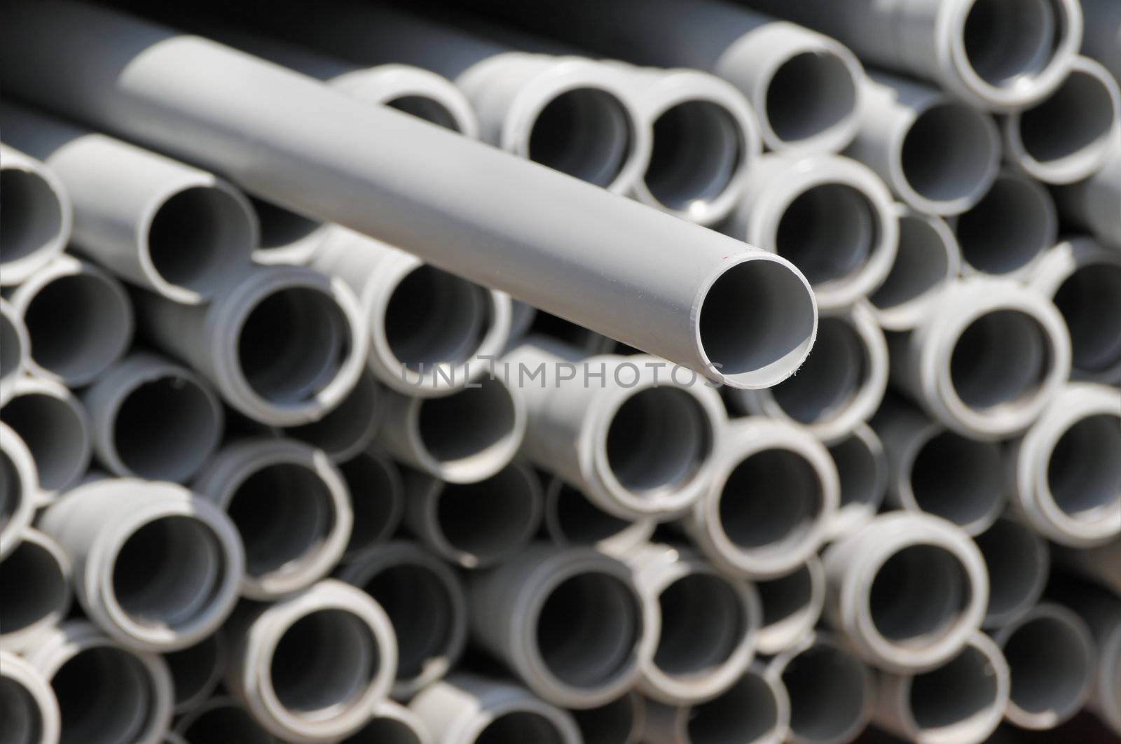 Close-up of a gray pipe stick out of a stack