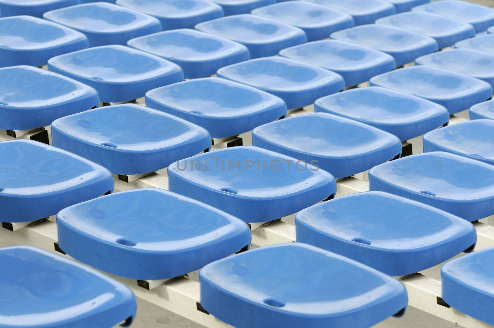 Rows of empty seats in a stadium