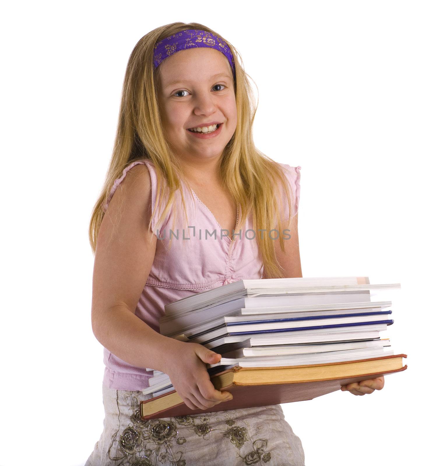 Girl carrying a pile of heavy books