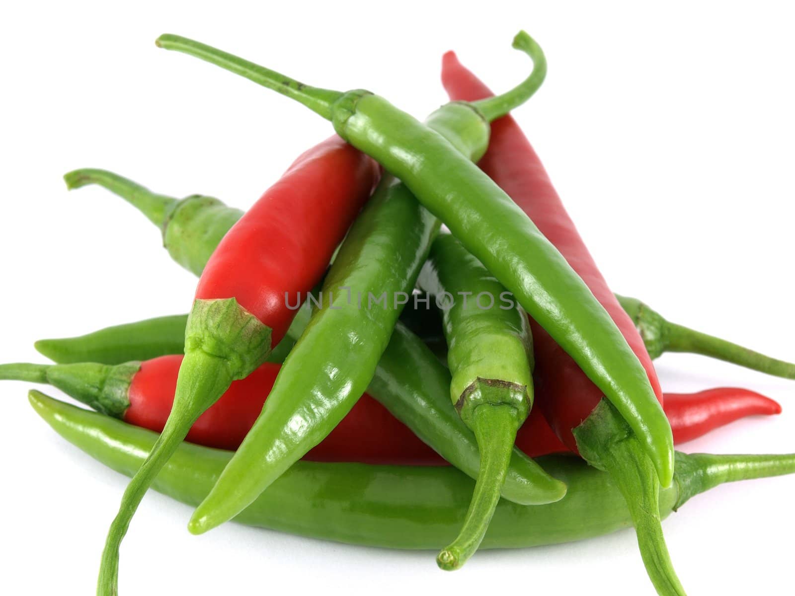 Piled red and green chilies