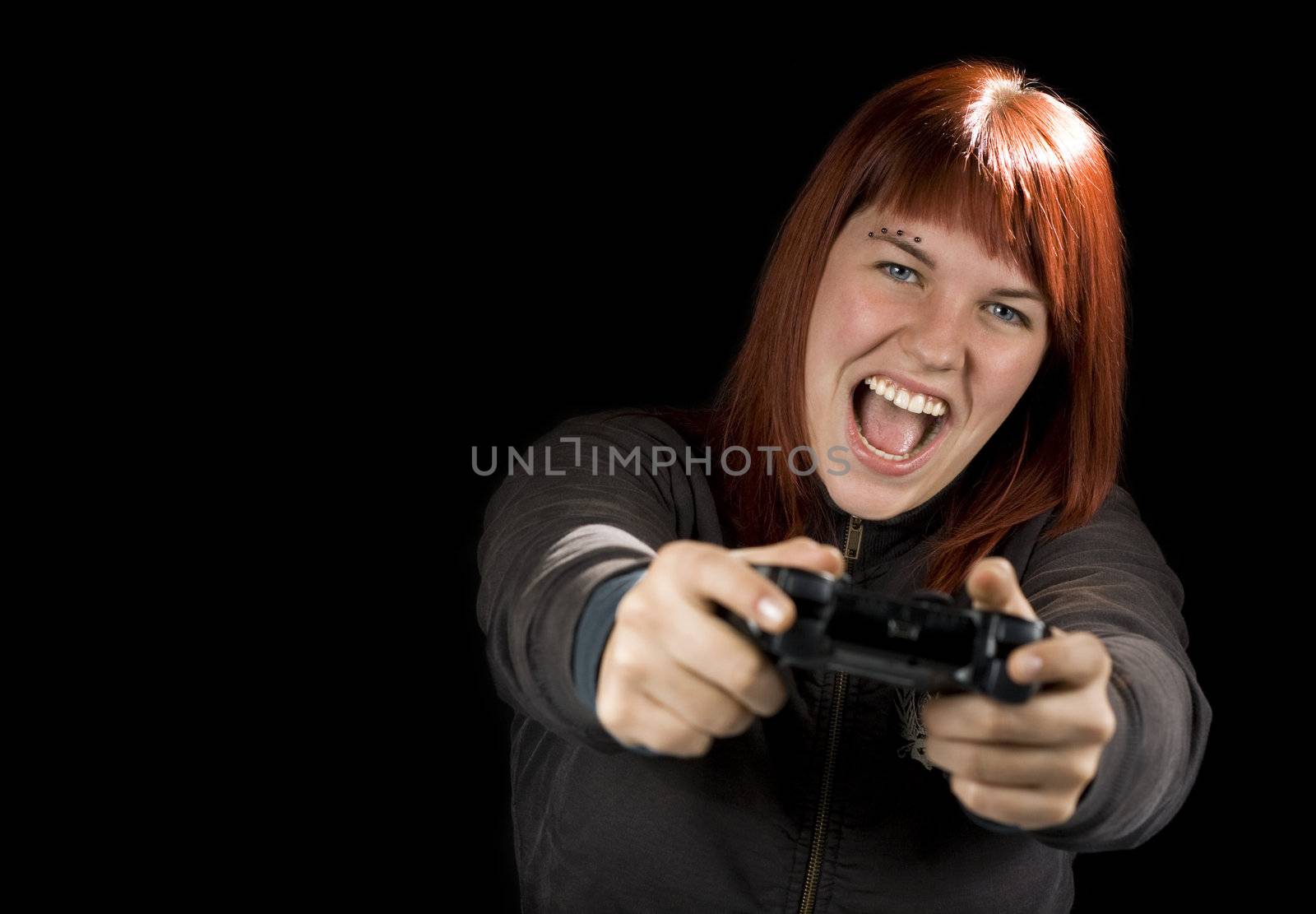 Girl using the sixaxis game controller and playing video games on her Playstation.