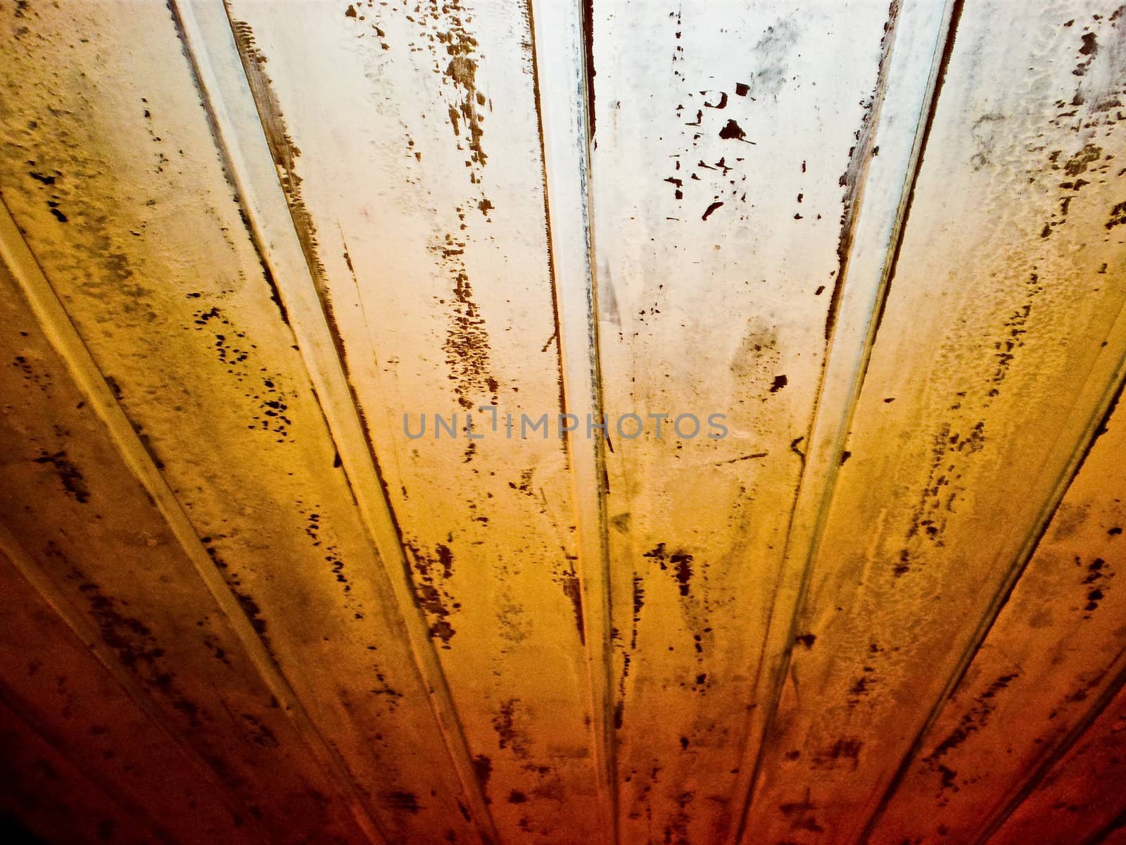 Wooden background with stains and cracks