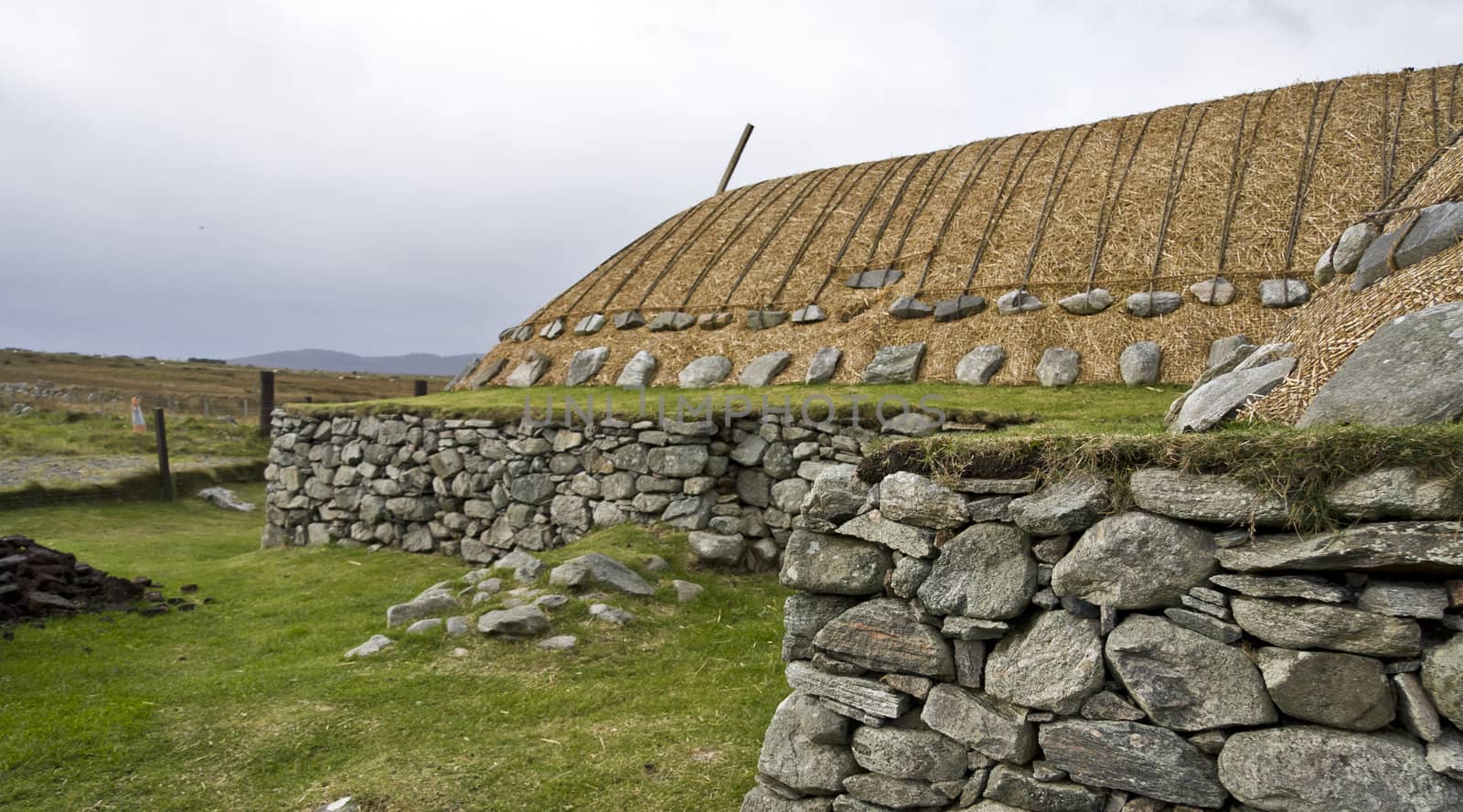 traditional scottish house with stones and reed