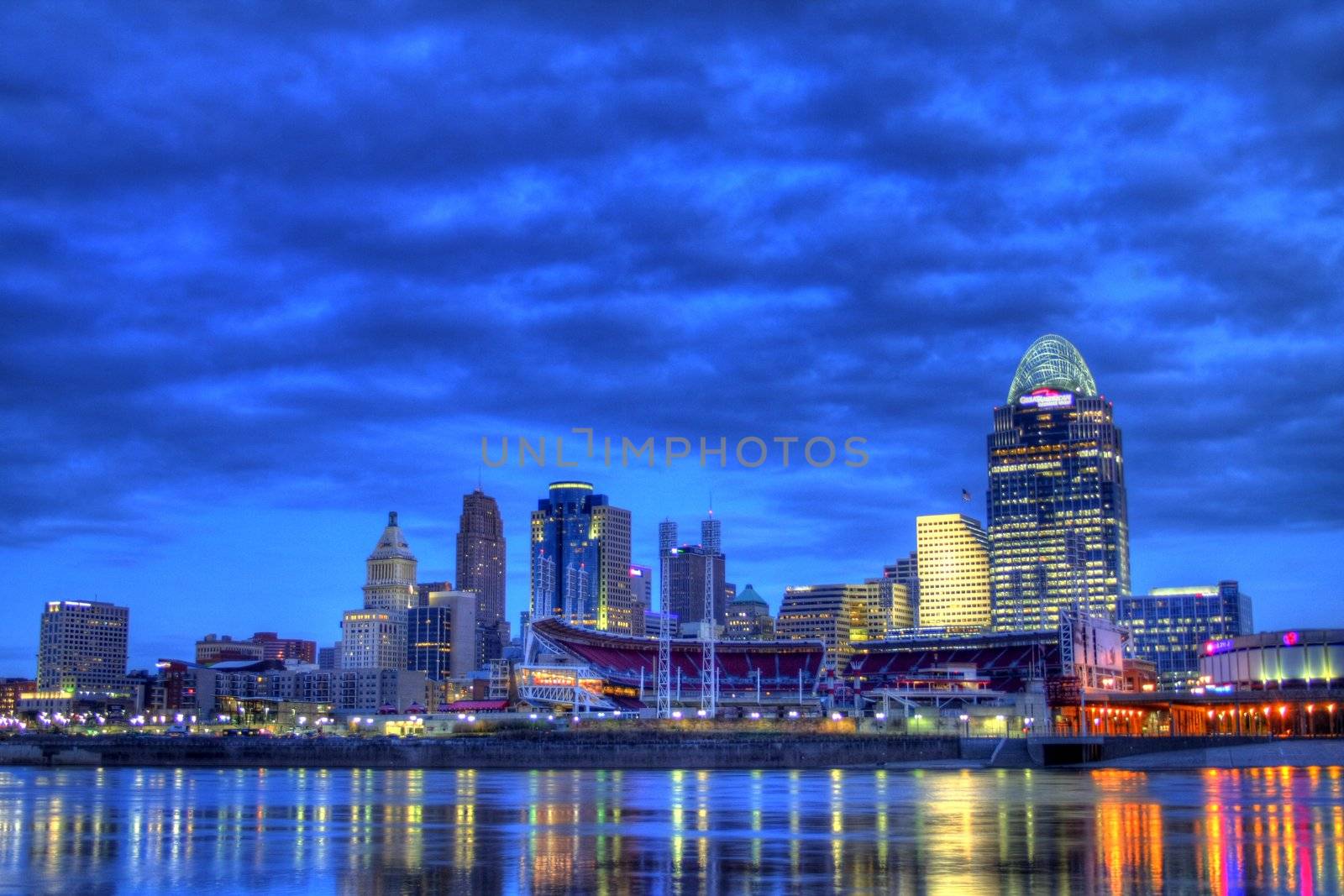 6am Cincinnati Ohio editorial skyline as seen from riverbank of Newport Kentucky