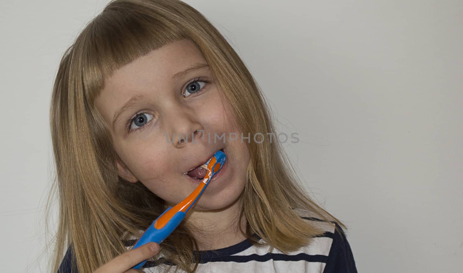 girl is brushing her tooth by Avialle