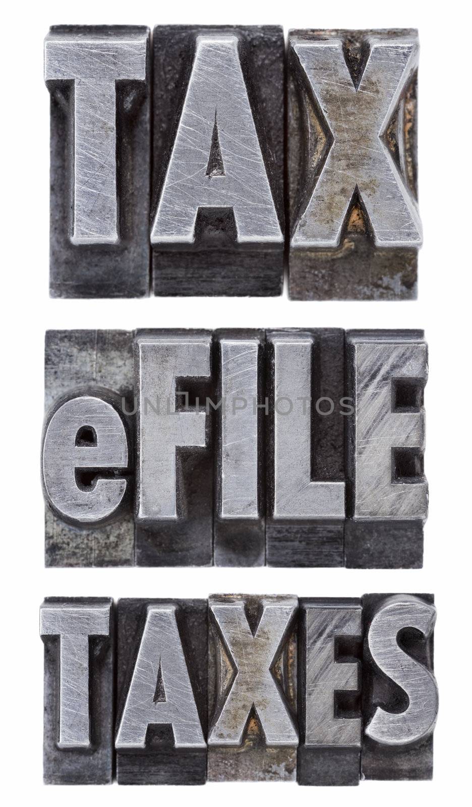 e-file taxes - tax concept - a collage of isolated words in vintage grunge metal letterpress type