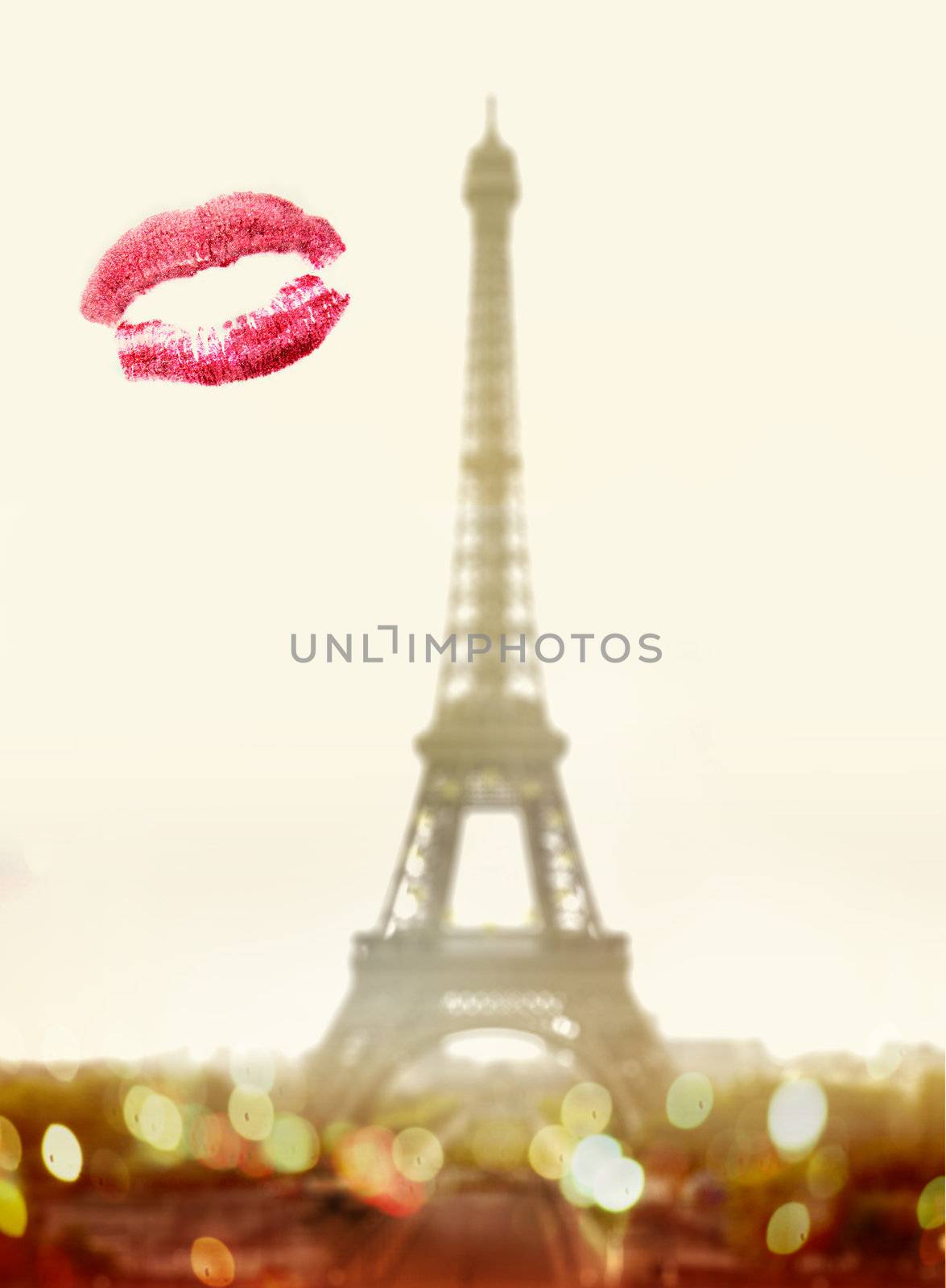 Lipstick kiss on window in front of famous Eiffel Tower in Paris