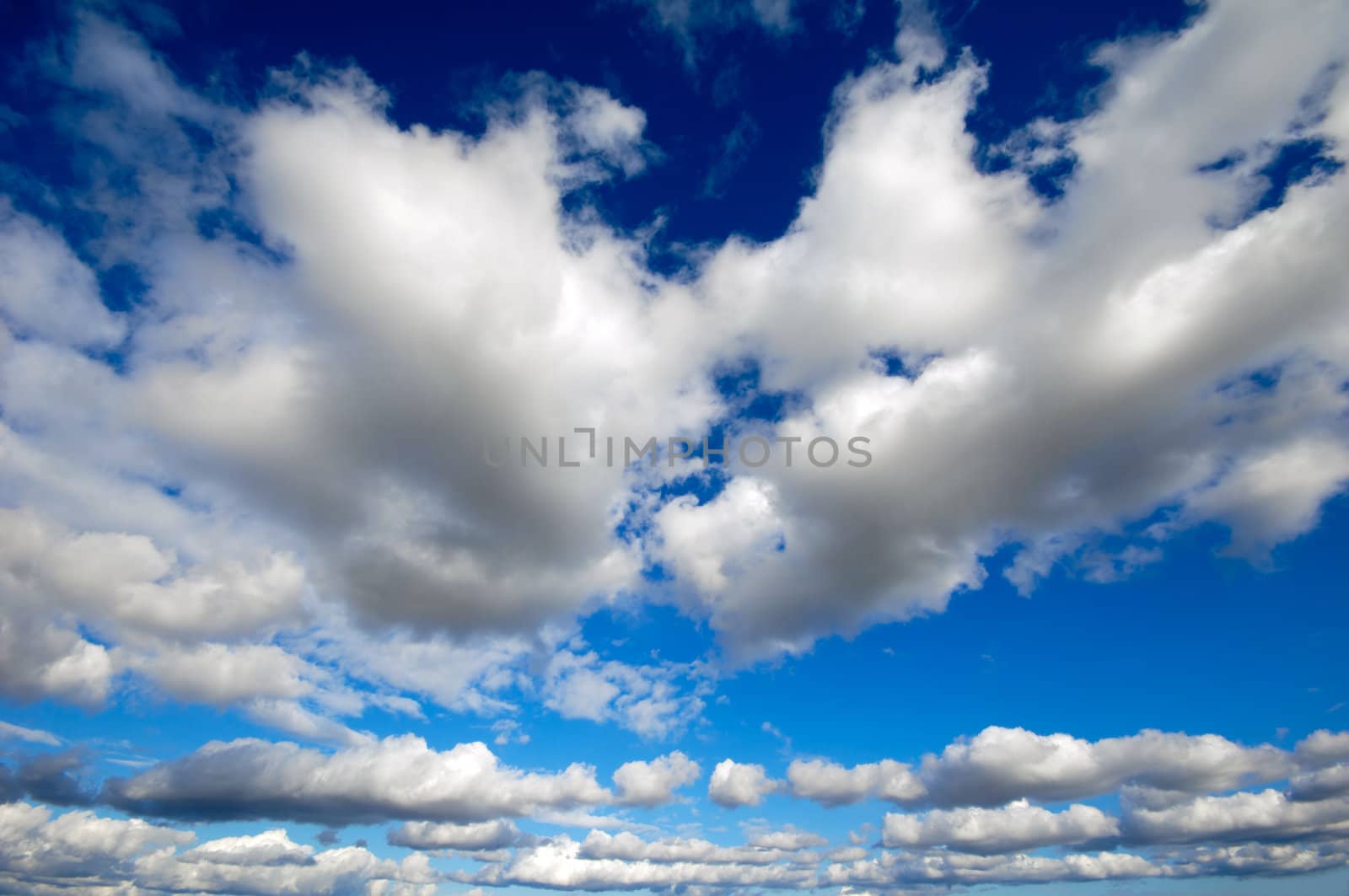 Cumulus cloudscape and a blue sky