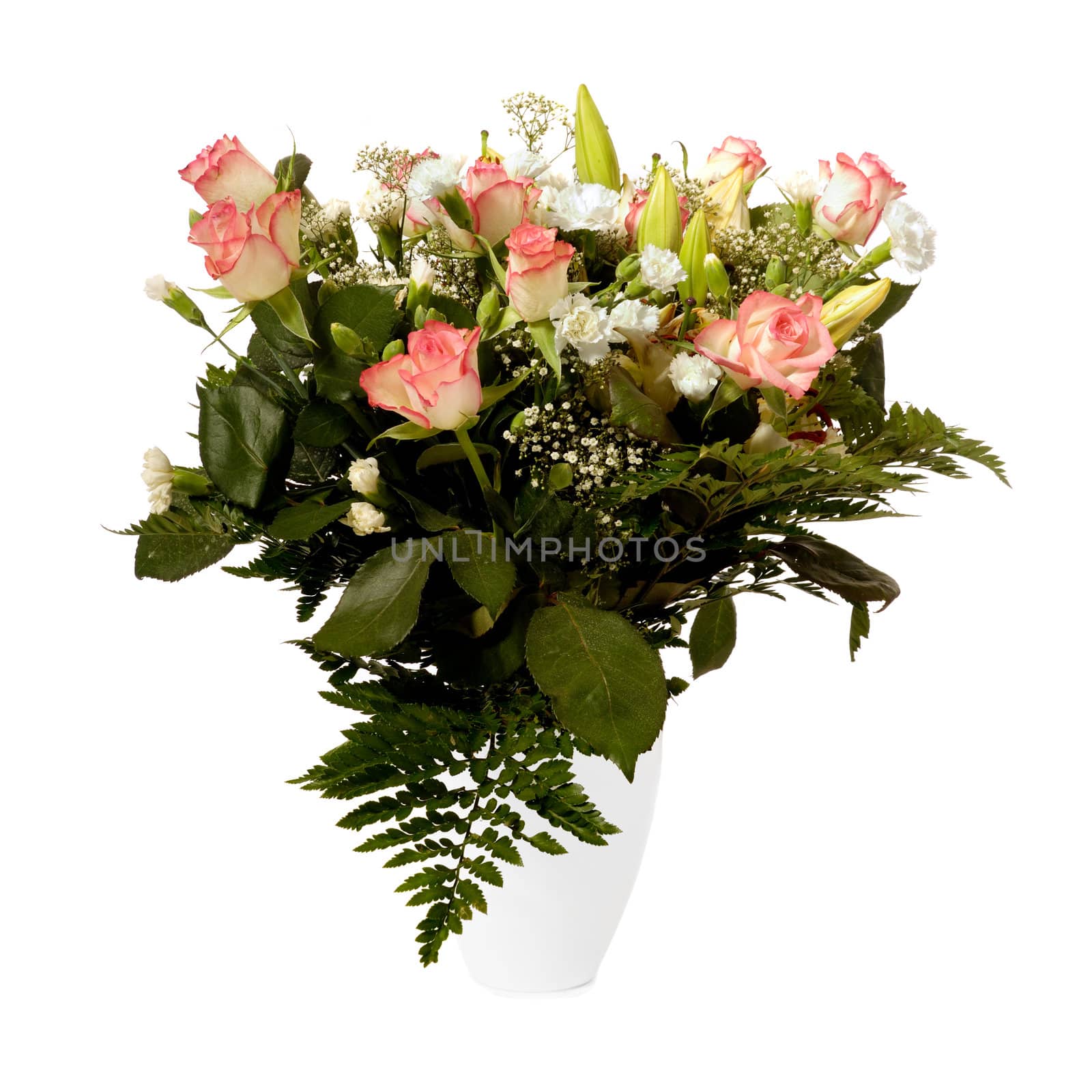 Bouquet of mixed flowers in a vase taken on a white background