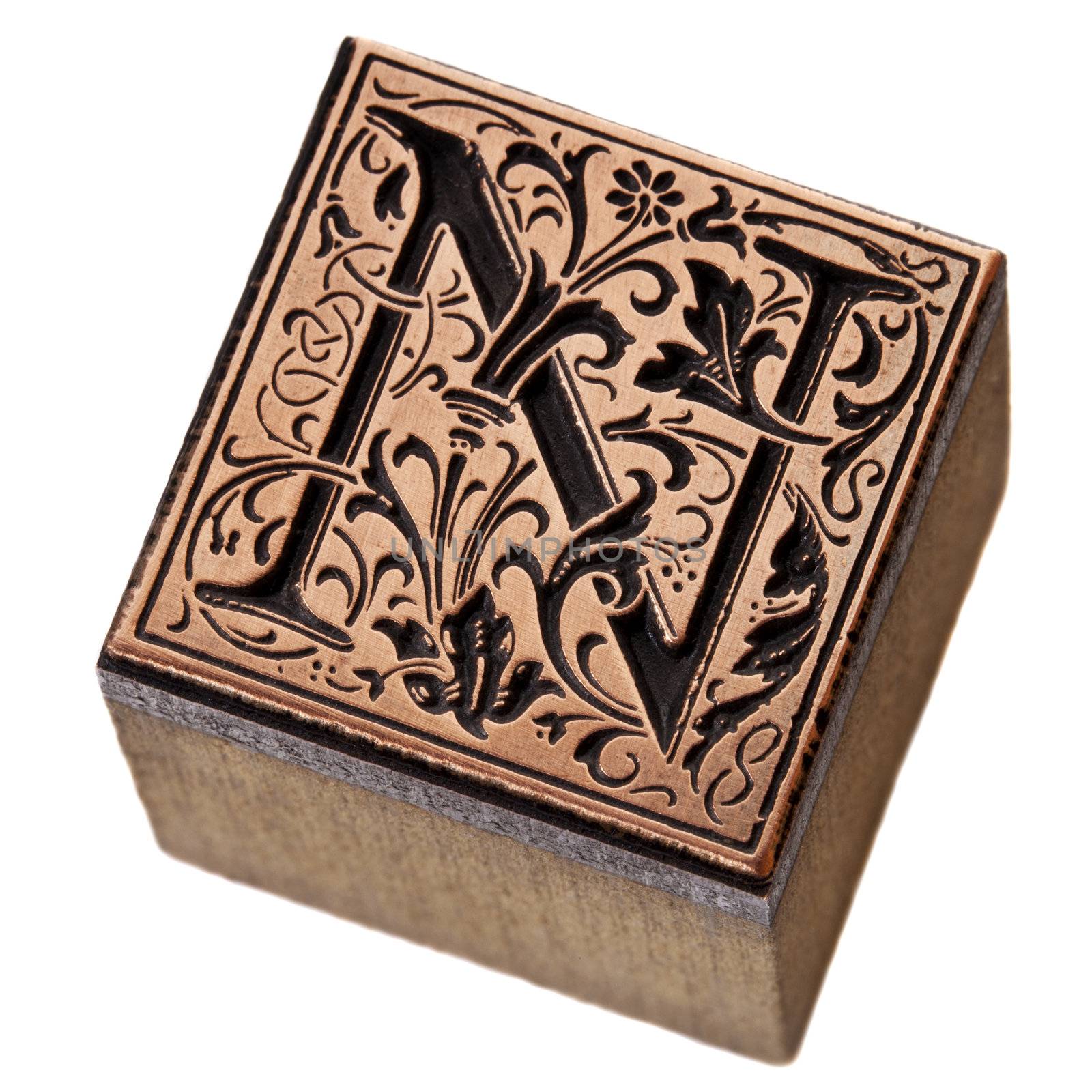 ornamental initial letter N - copper and wood vintage letterpress printing block