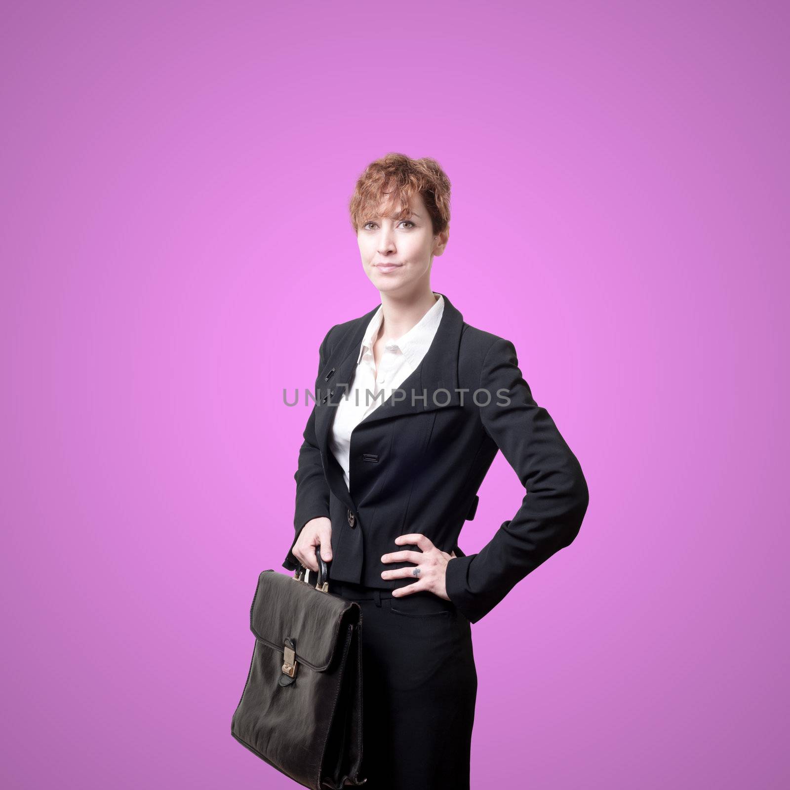 business woman with briefcase on pink background