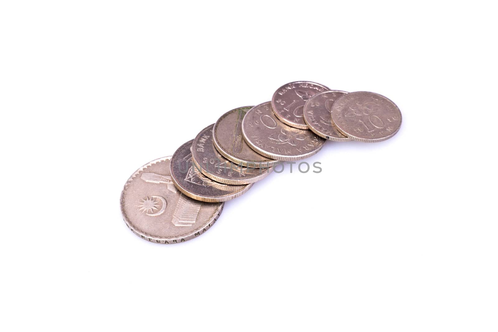 Malaysian coins of various price on white background