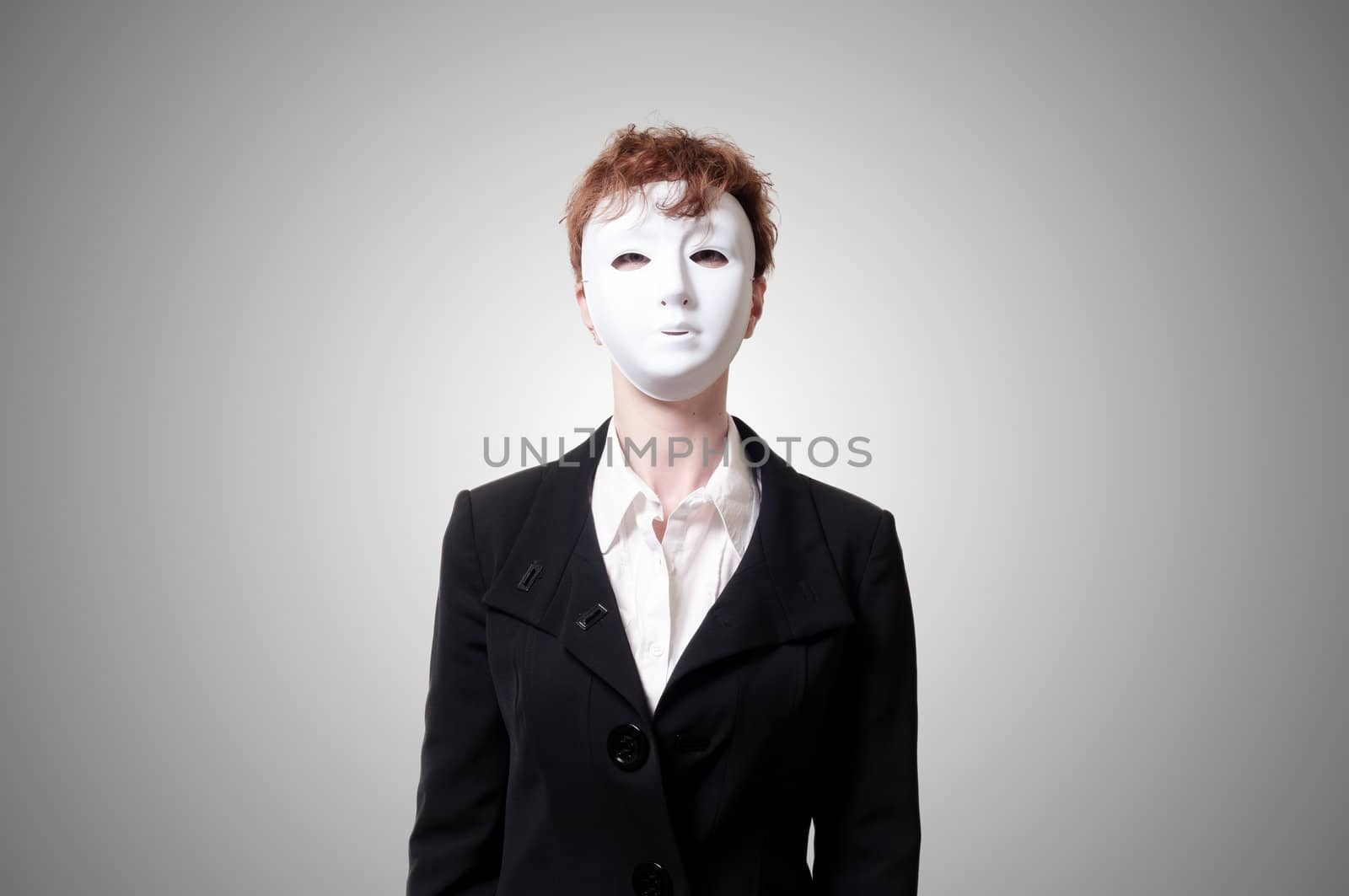 business girl with white mask on gray background