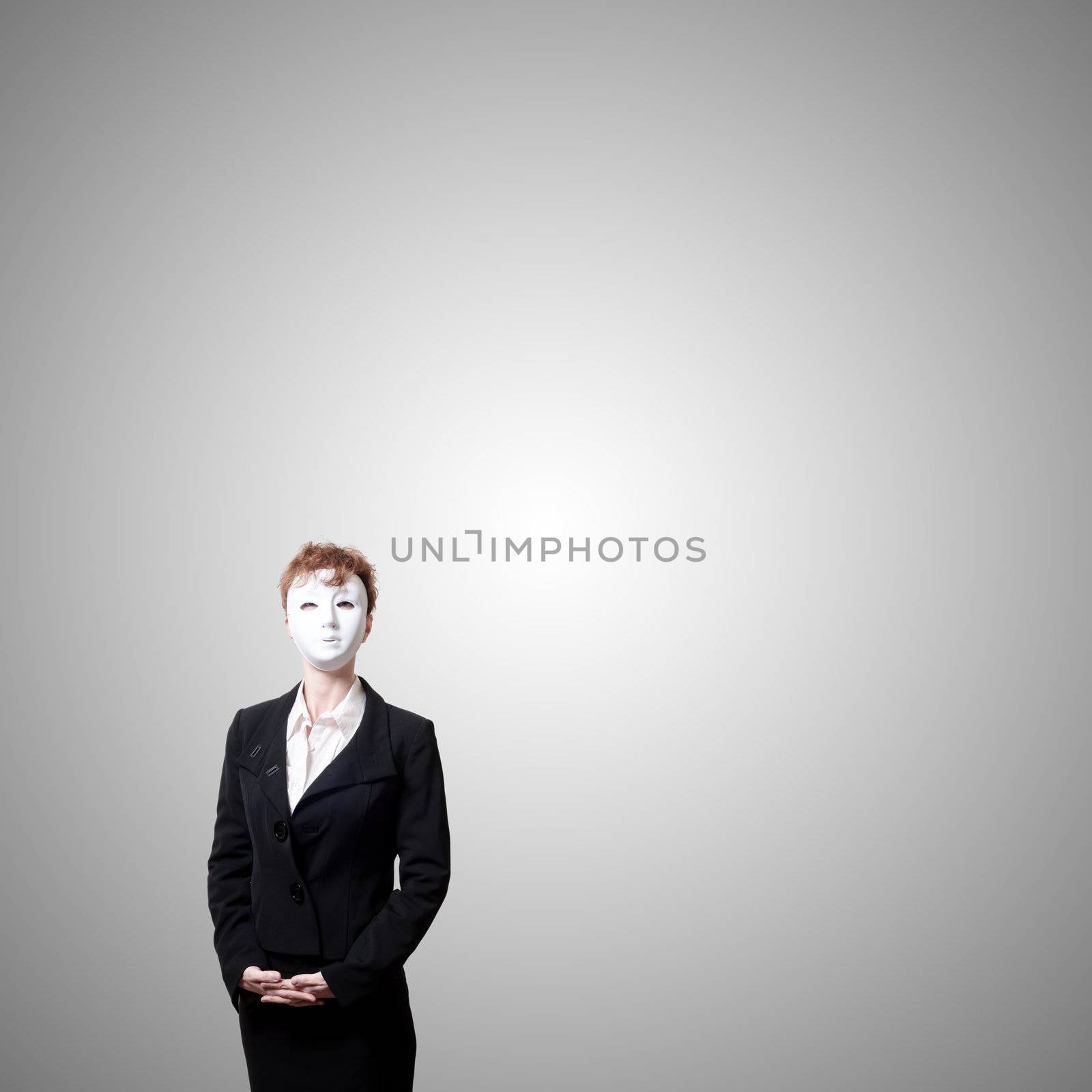 business girl with white mask on gray background