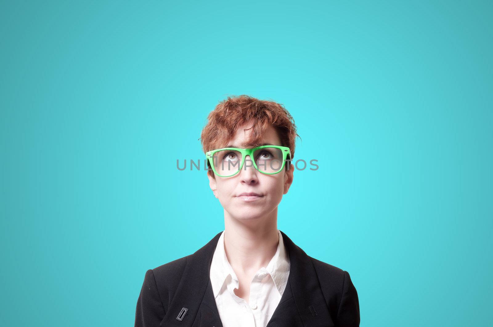 business woman with green eyeglasses on blue background