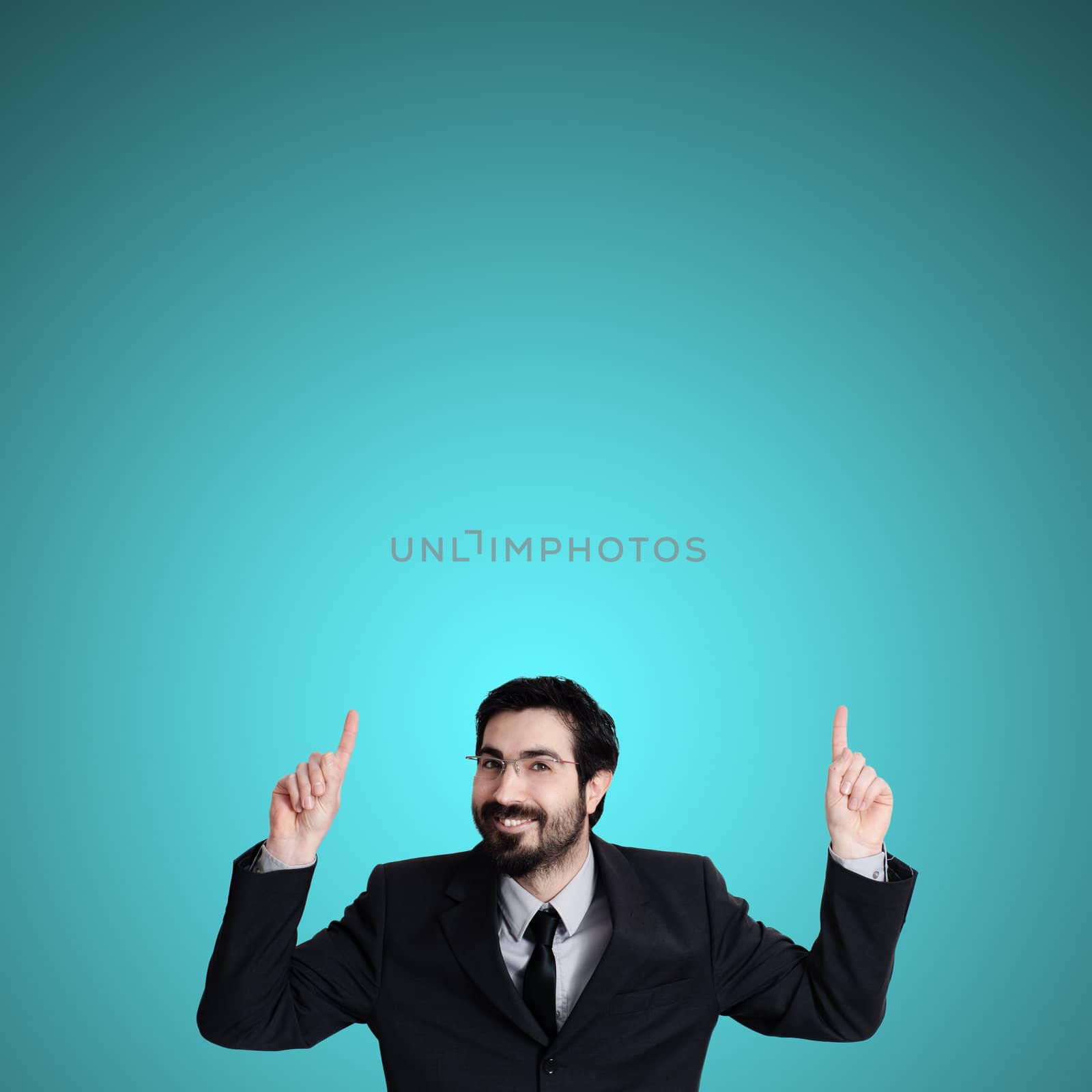 success business man pointing on blue background