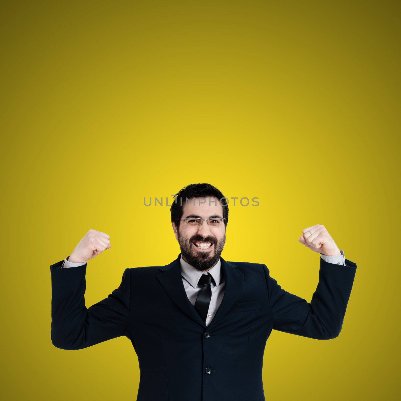 strong business man flexing muscle on yellow background