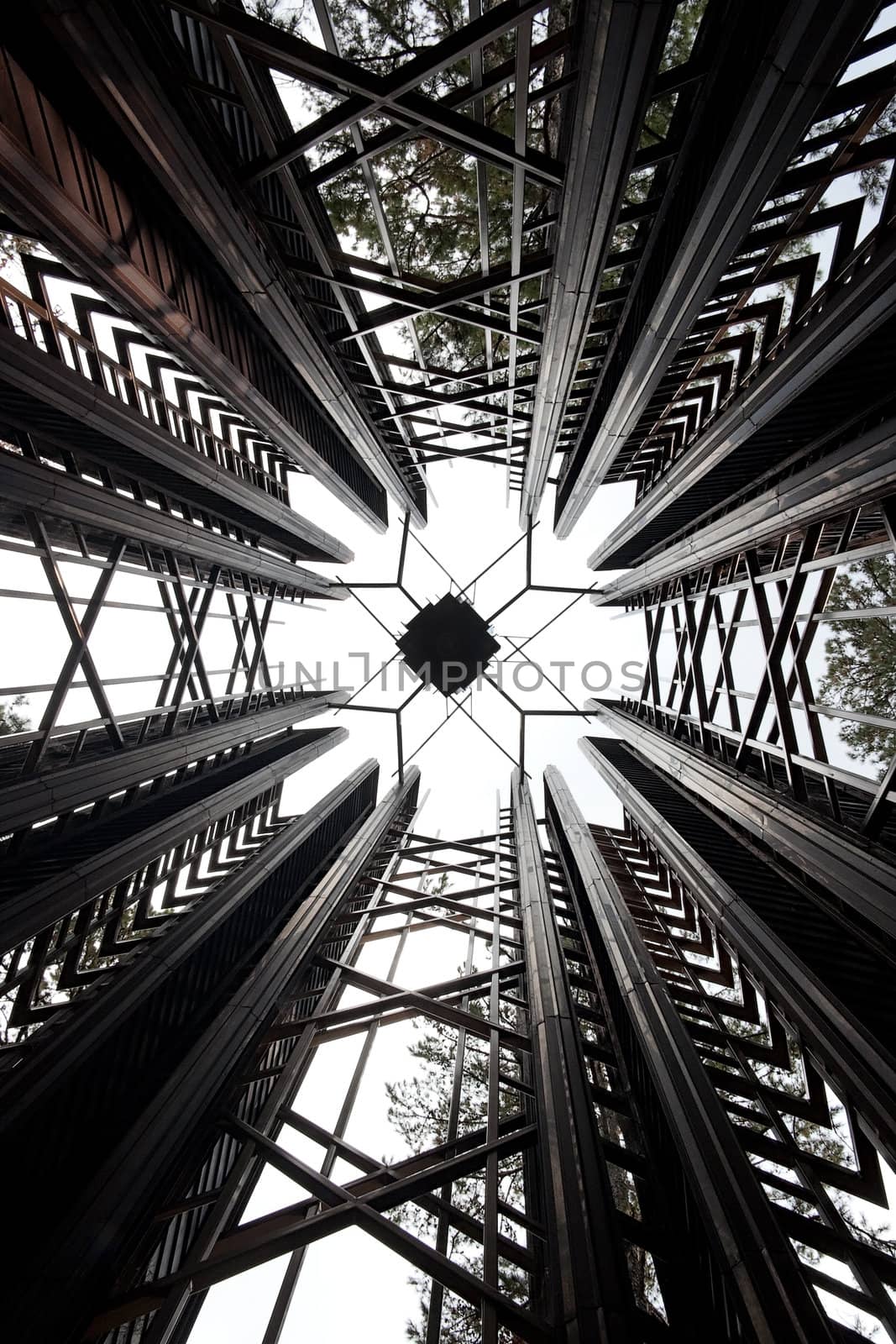 An abstract center of a wood ceiling inside a tower