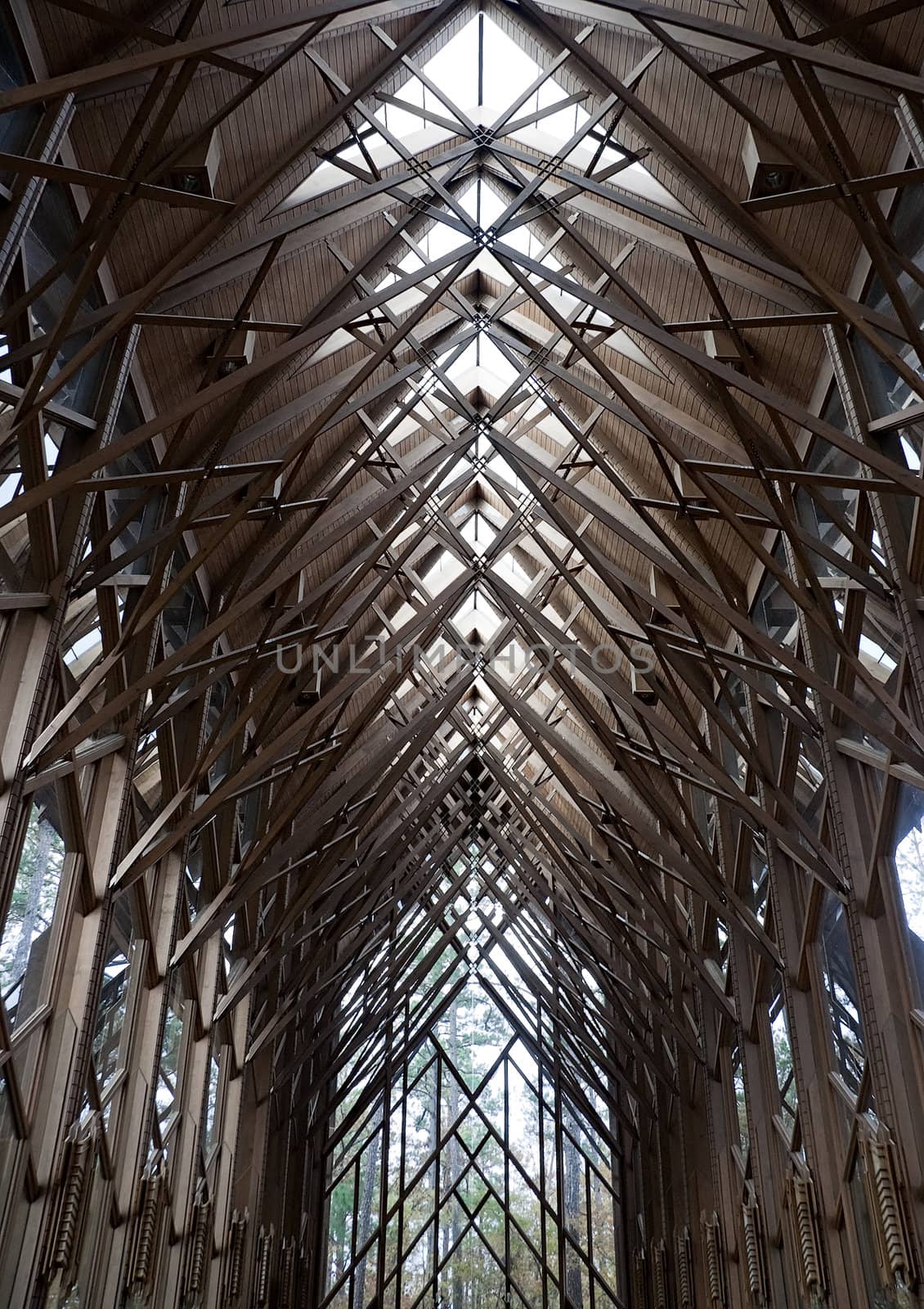 The ceiling of a wooden and glass church