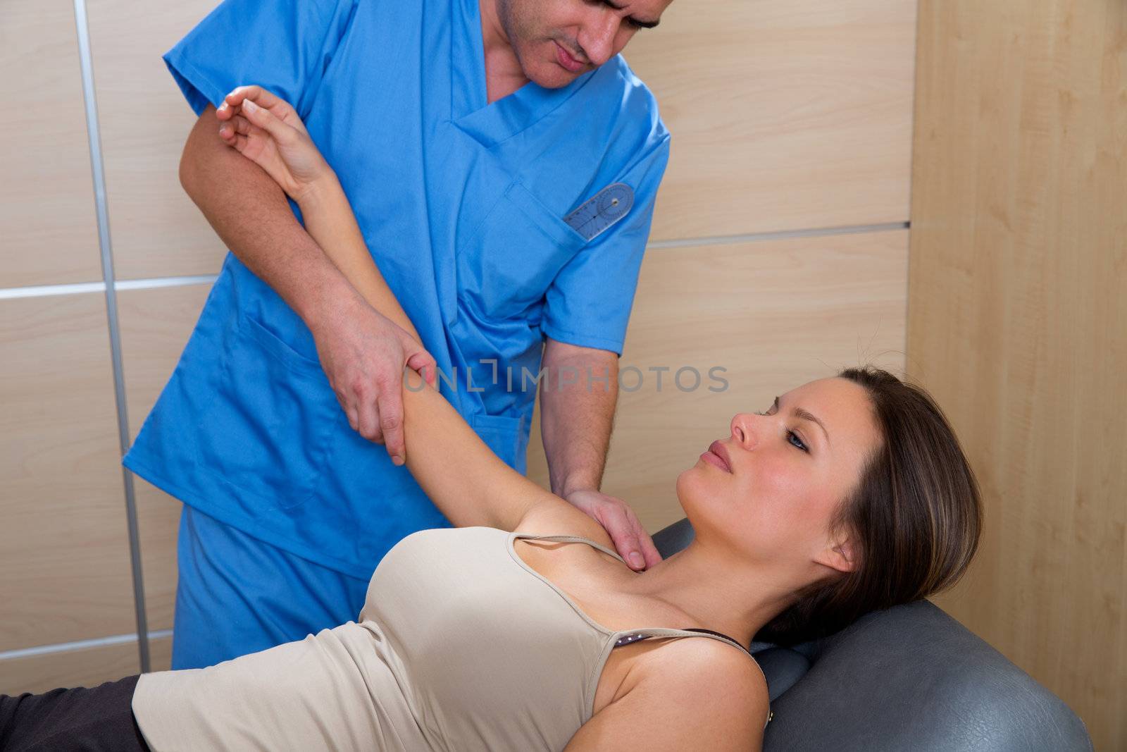 Shoulder physiotherapy doctor therapist and woman patient at hospital