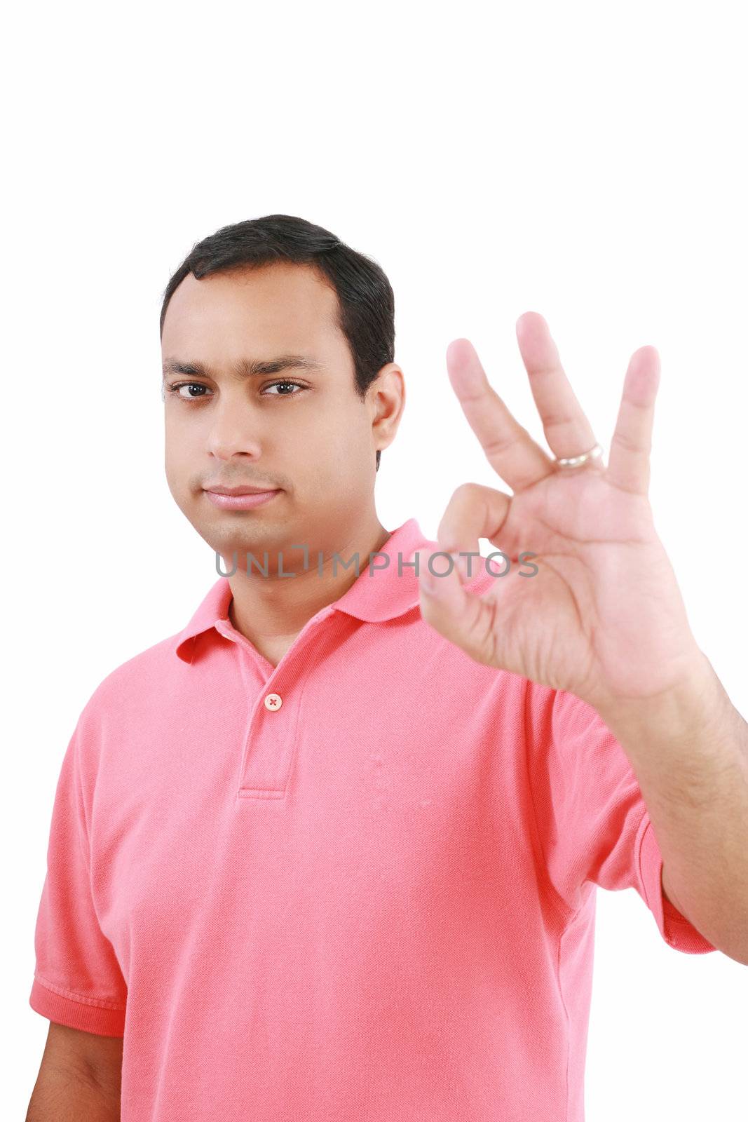 Happy handsome smiling man. Isolated over white background. Focus on man