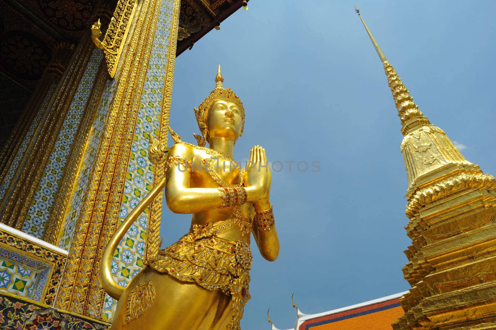 Mythical female bird with a human headache at Emerald Buddha temple in Bangkok,Thailand.