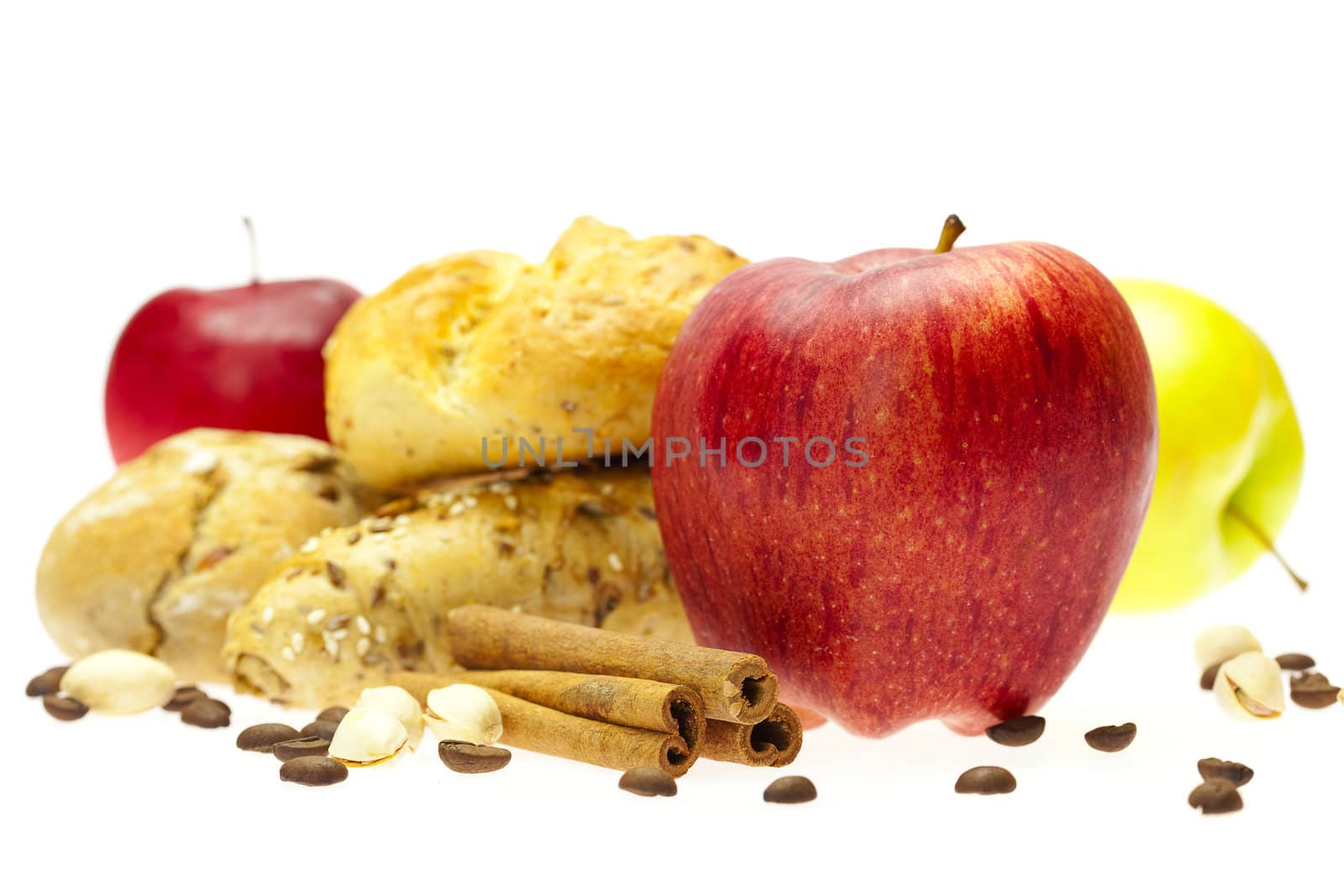 apple, bread and cinnamon isolated on white
